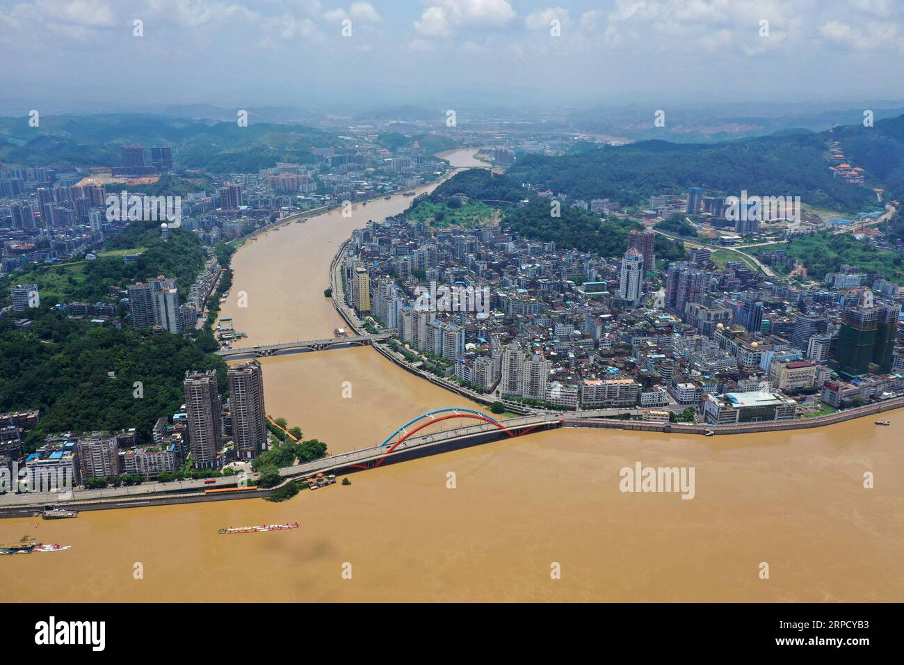 (190716) -- WUZHOU, July 16, 2019 -- Aerial photo taken on July 16, 2019 shows flood passing through Wuzhou, south China s Guangxi Zhuang Autonomous Region. The water level at Wuzhou hydrological station of the Xijiang River reached 19.82 meters Tuesday, 1.32 meters higher than the warning level. ) CHINA-GUANGXI-WUZHOU-FLOOD (CN) LuxBoan PUBLICATIONxNOTxINxCHN Stock Photo