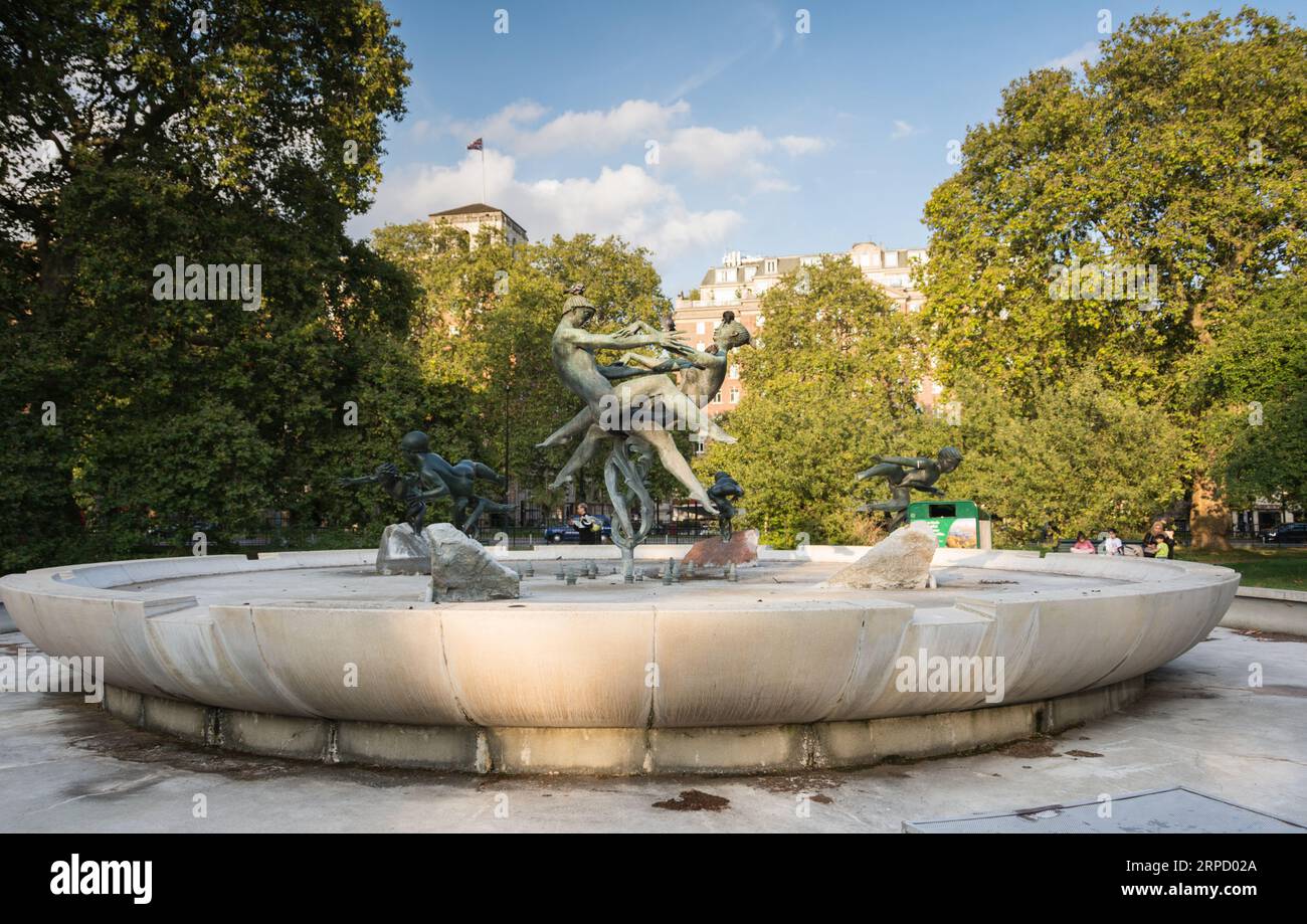 An empty, waterless and unloved Joy of Life Fountain by T. B. Huxley-Jones in Hyde Park, London, W1, England, U.K. Stock Photo