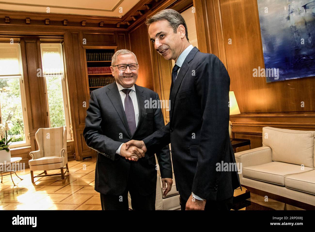 190717 -- ATHENS, July 17, 2019 Xinhua -- Greek Prime Minister Kyriakos Mitsotakis R shakes hands with Managing Director of the European Stability Mechanism ESM Klaus Regling at the Prime Minister s Office in Athens, Greece, on July 16, 2019. Xinhua/Panagiotis Moschandreou GREECE-ATHENS-PM-ESM-MEETING PUBLICATIONxNOTxINxCHN Stock Photo