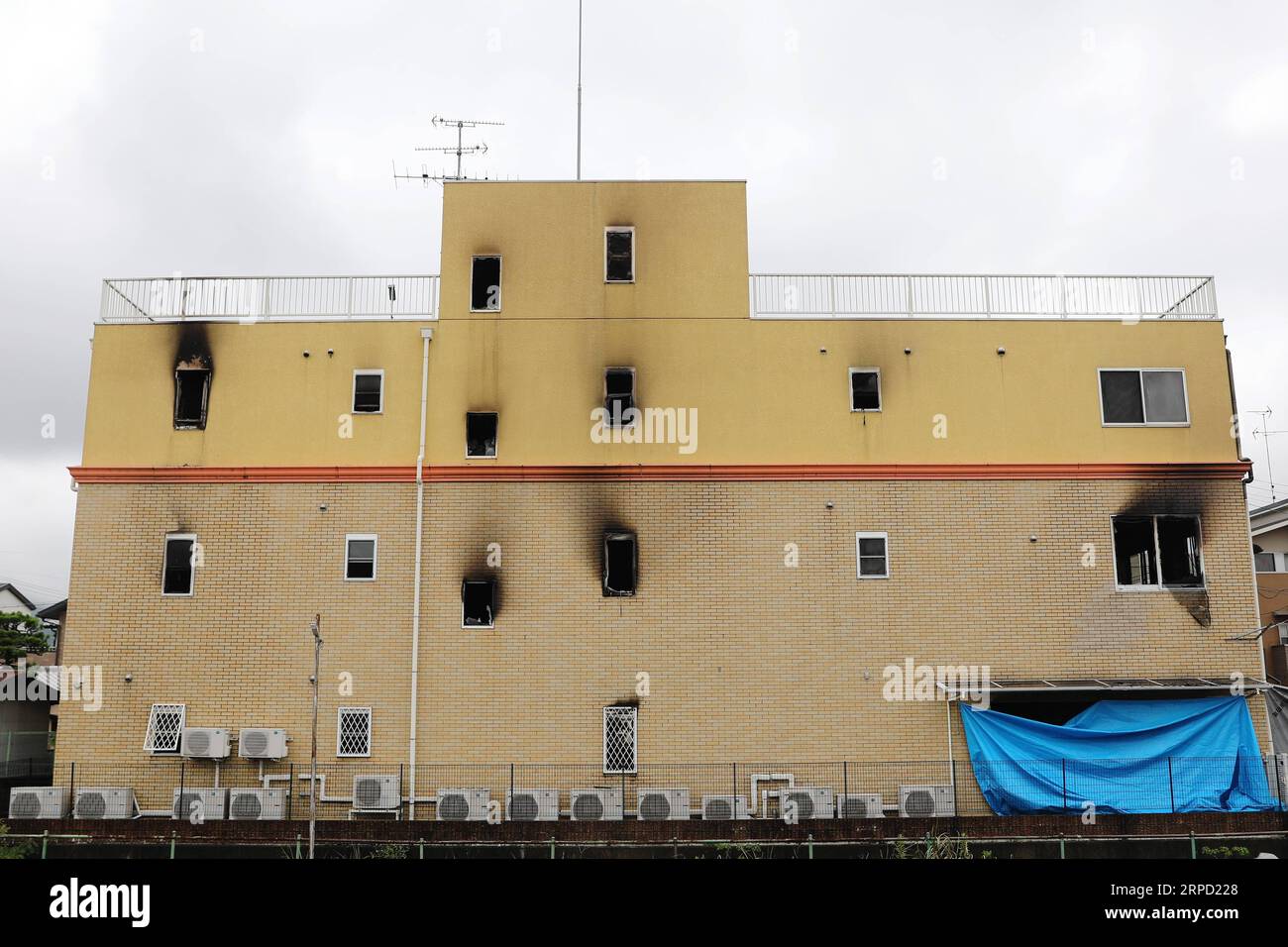 (190719) -- KYOTO, July 19, 2019 -- Photo taken on July 19, 2019 shows a Kyoto Animation studio building after an arson attack in Kyoto, Japan. The motive behind an alleged arson attack on a studio of Kyoto Animation Co. in western Japan, which killed 33 people a day earlier, may have been the theft of ideas, sources said Friday. Local media quoting investigative sources, said that a 41-year-old man apprehended over the alleged arson attack told police he started the fire at the three-story studio because the company stole a novel. ) JAPAN-KYOTO-ANIME STUDIO FIRE DuxXiaoyi PUBLICATIONxNOTxINxC Stock Photo