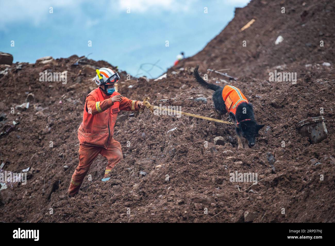 (190726) -- BEIJING, July 26, 2019 -- A rescuer works at the landslide site in Shuicheng County of Liupanshui City, southwest China s Guizhou Province, July 25, 2019. The death toll has risen to 15 after a landslide hit southwest China s Guizhou Province, local authorities said Thursday. ) XINHUA PHOTOS OF THE DAY TaoxLiang PUBLICATIONxNOTxINxCHN Stock Photo