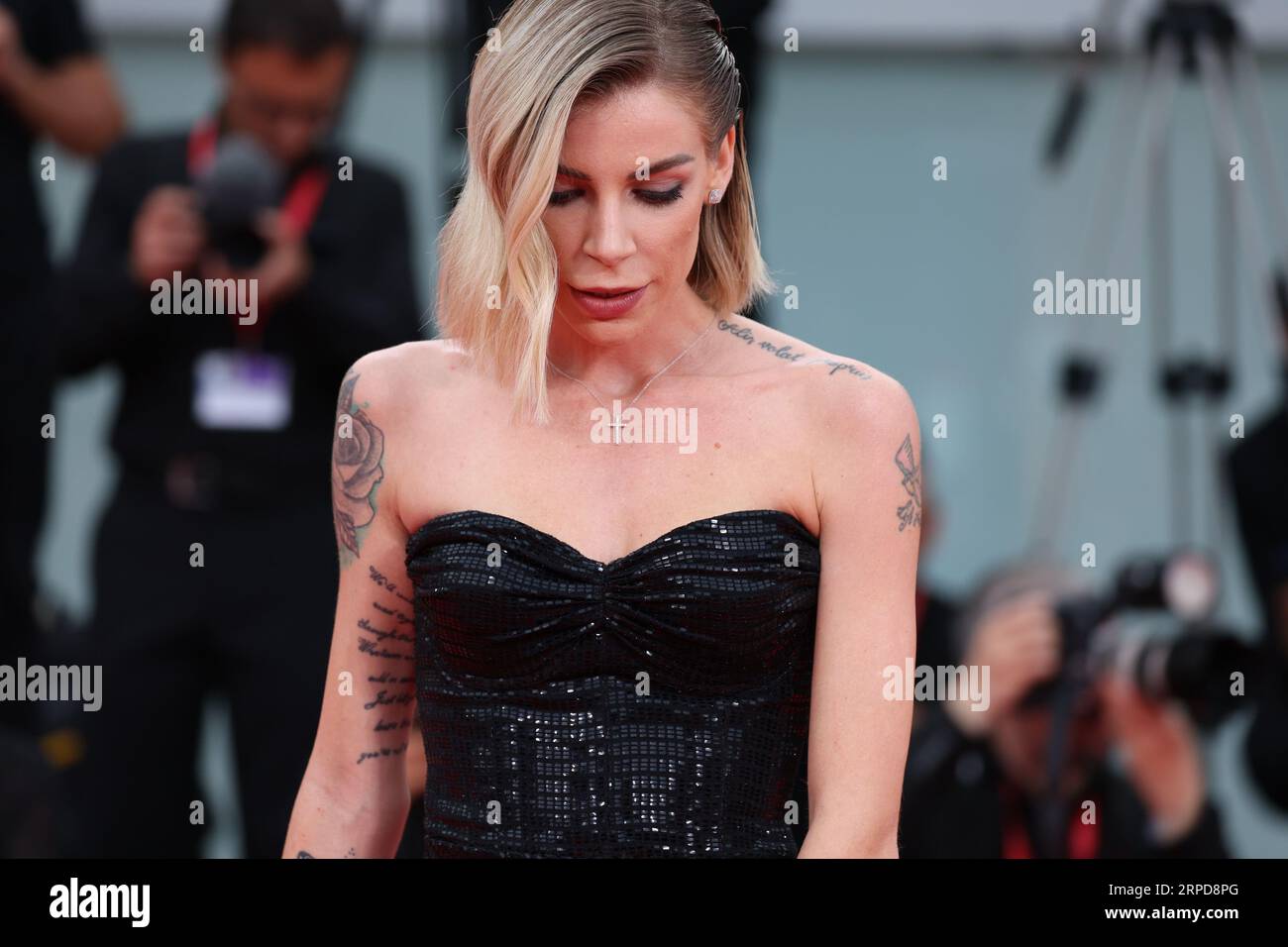 Nina Rima attends a red carpet for the movie "The Killer" at the 80th