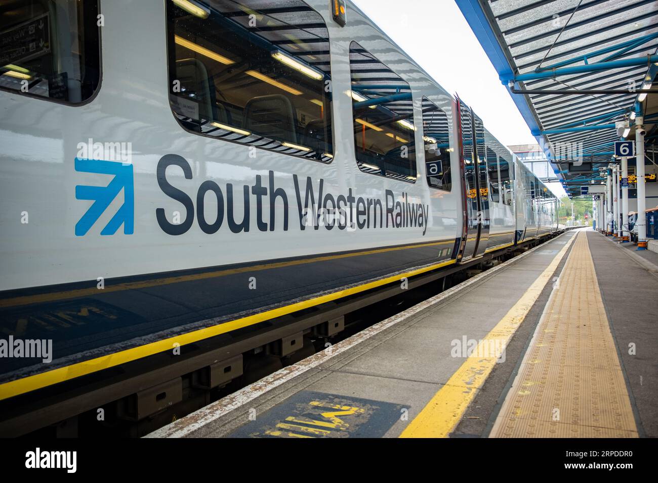 GUILDFORD, SURREY, UK- AUGUST 31, 2023: South Western Railway train on platform at Guildford Station- Surrey train station on the Portsmouth Direct Li Stock Photo