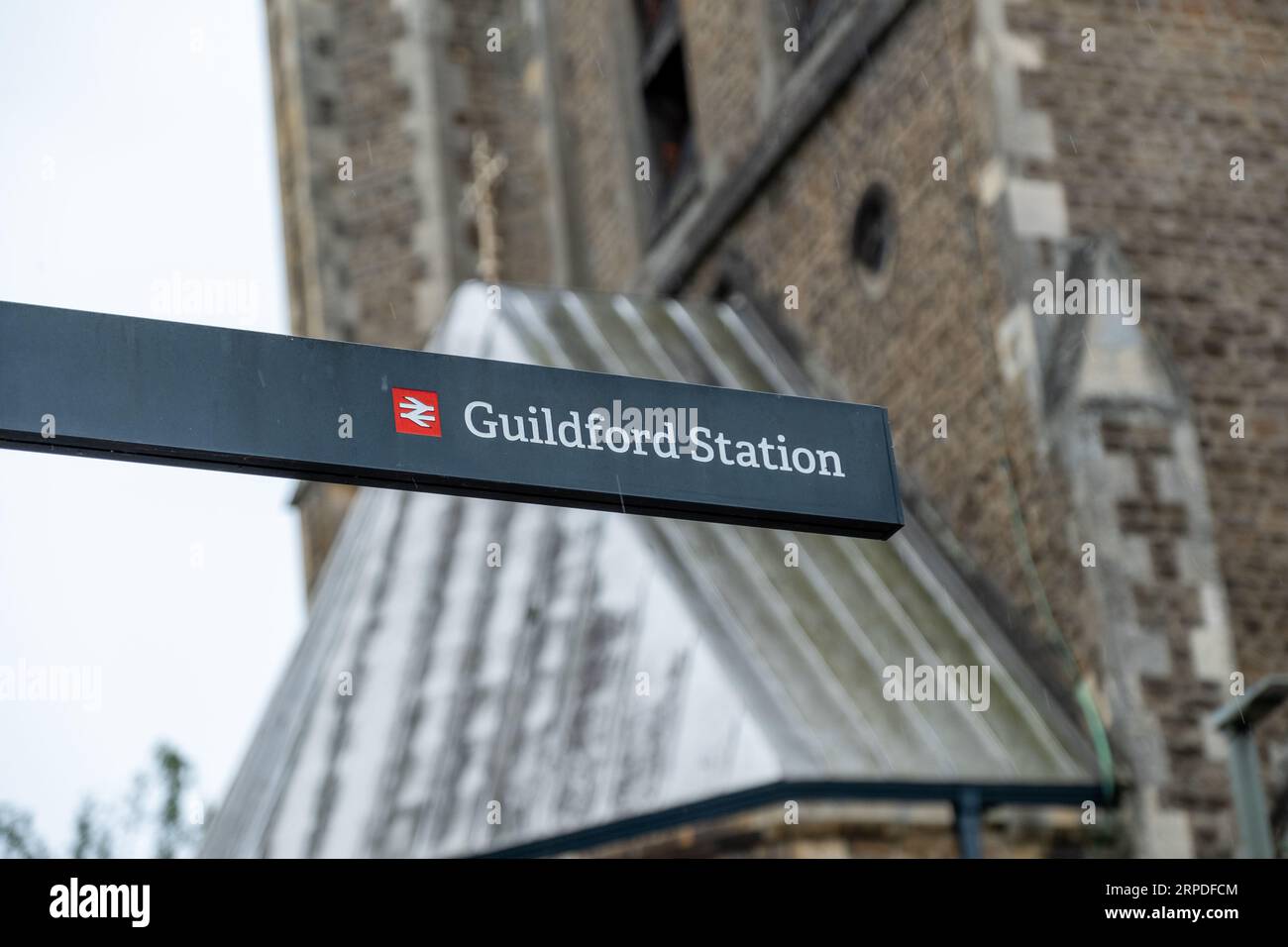GUILDFORD, SURREY- AUGUST 31, 2023: Guildford Railway Station, directional signage from the nearby Guildford town centre Stock Photo