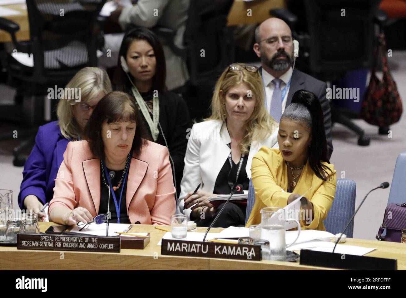 New York, Sitzung des UN-Sicherheitsrats (190802) -- UNITED NATIONS, Aug. 2, 2019 -- Mariatu Kamara (R, front), United Nations Children s Fund (UNICEF) Canada s Special Representative for Children in Armed Conflict, addresses a Security Council meeting on children and armed conflict, at the UN headquarters in New York, Aug. 2, 2019. Mariatu Kamara, who was born and raised in a small village in Sierra Leone and is now serving as the UNICEF Canada s Special Representative, shared at the Security Council on Friday her own story and called for protection for children in armed conflicts. ) UN-SECUR Stock Photo