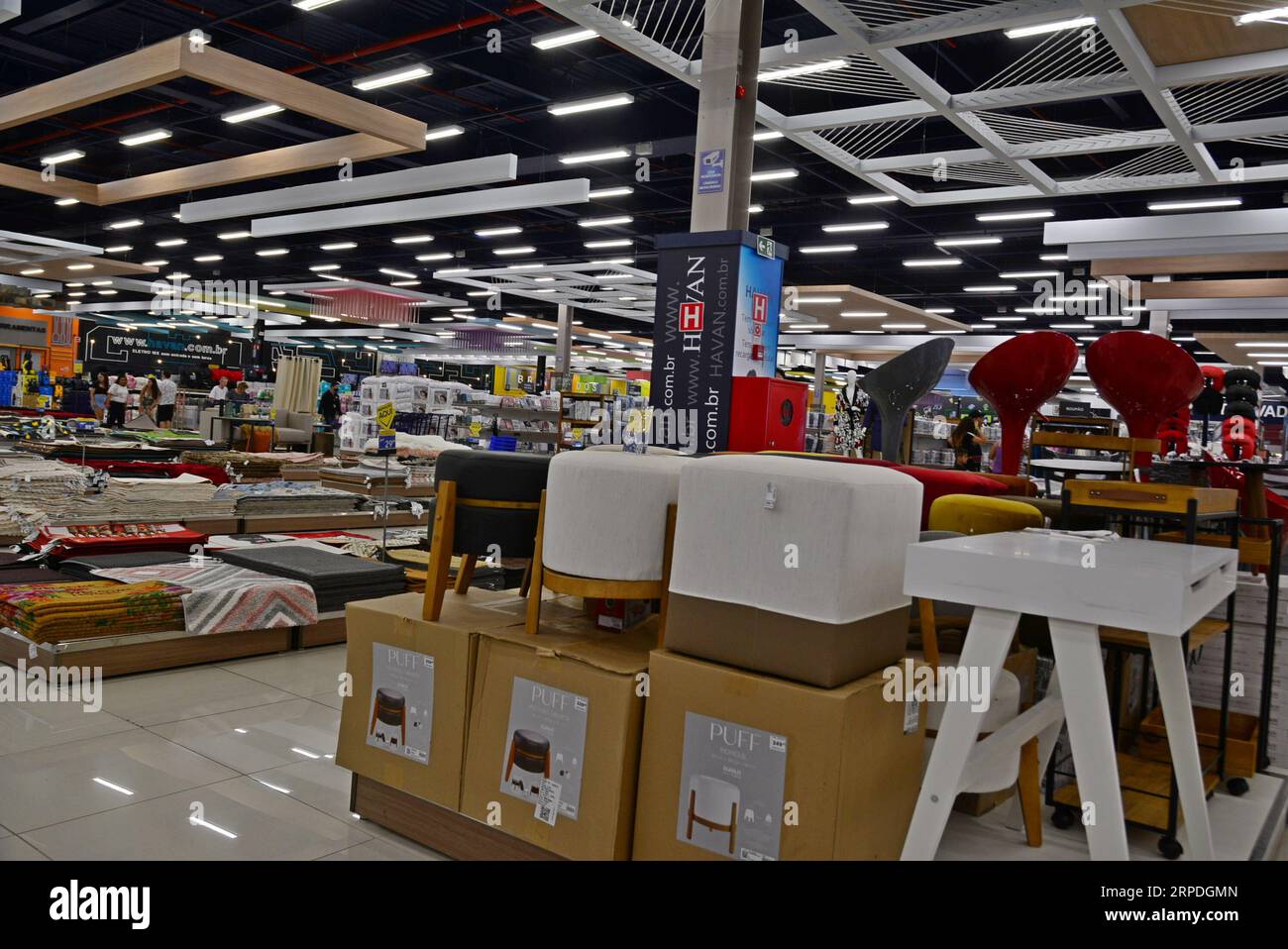 department store, with a variety of products for sale, carpet section, home utilities, panoramic view, Brazil, South America, with customers in the ba Stock Photo