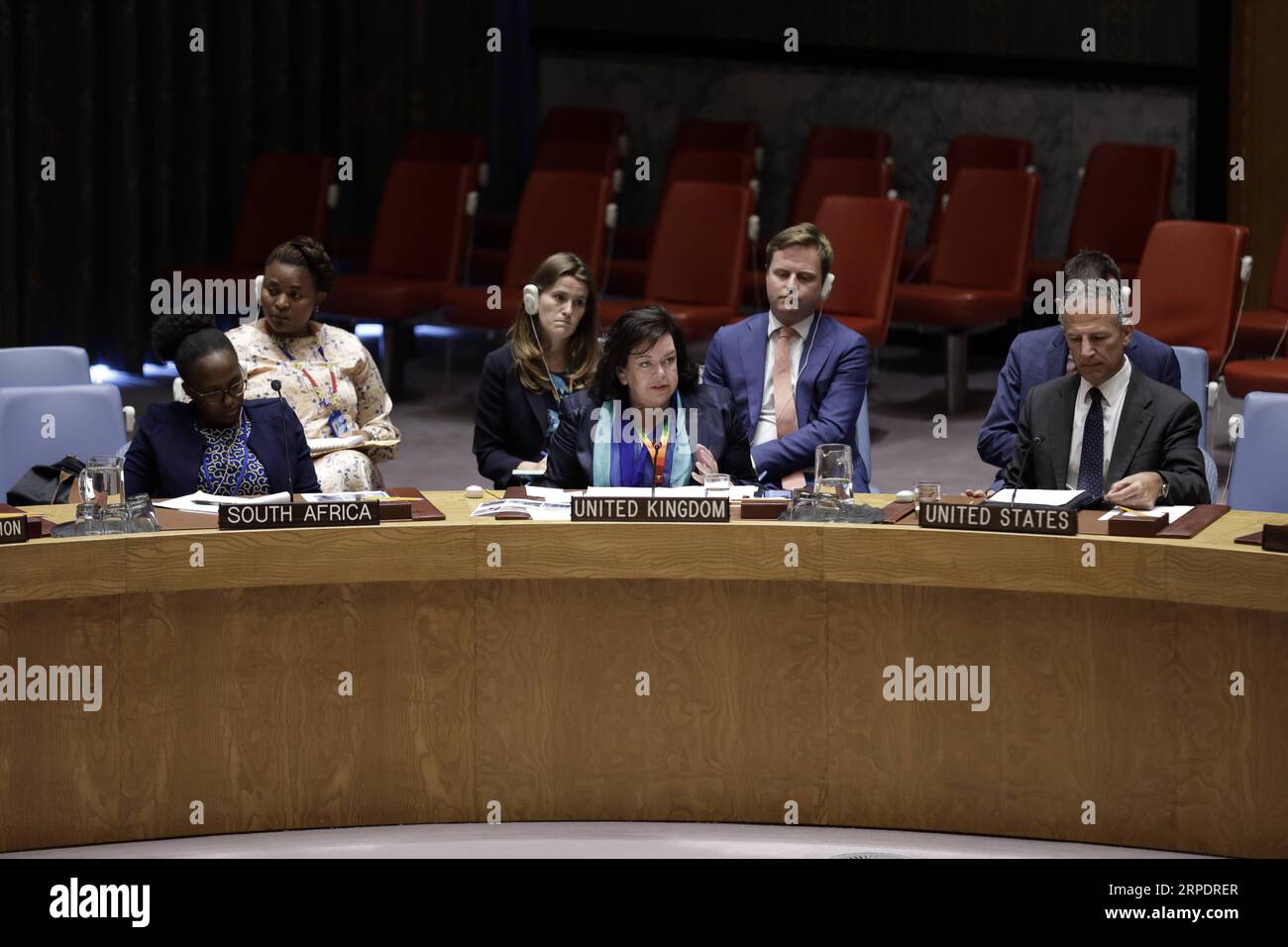 (190810) -- UNITED NATIONS, Aug. 10, 2019 -- British Ambassador to the United Nations Karen Pierce (C,front) addresses a Security Council emergency meeting on the situation in Libya at the UN headquarters in New York, Aug. 10, 2019. United Nations Security Council on Saturday strongly condemned the car bomb attack in Benghazi, Libya, in which three UN staff members were killed and several others injured. ) UN-SECURITY COUNCIL-EMERGENCY MEETING-LIBYA LixMuzi PUBLICATIONxNOTxINxCHN Stock Photo