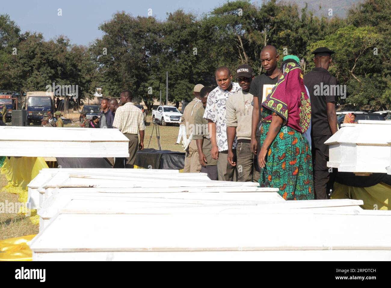 (190811) -- MOROGORO, Aug. 11, 2019 -- People attend a burial ceremony for victims of a tanker explosion in Morogoro, Tanzania on Aug. 11, 2019. Tanzanian President John Magufuli has declared three days of national mourning following an oil tanker explosion that killed over 60 people and injured 70 others in Morogoro on Saturday, said a statement released early Sunday. TANZANIA-MOROGORO-TANKER-EXPLOSION-MOURNING Lisibo PUBLICATIONxNOTxINxCHN Stock Photo