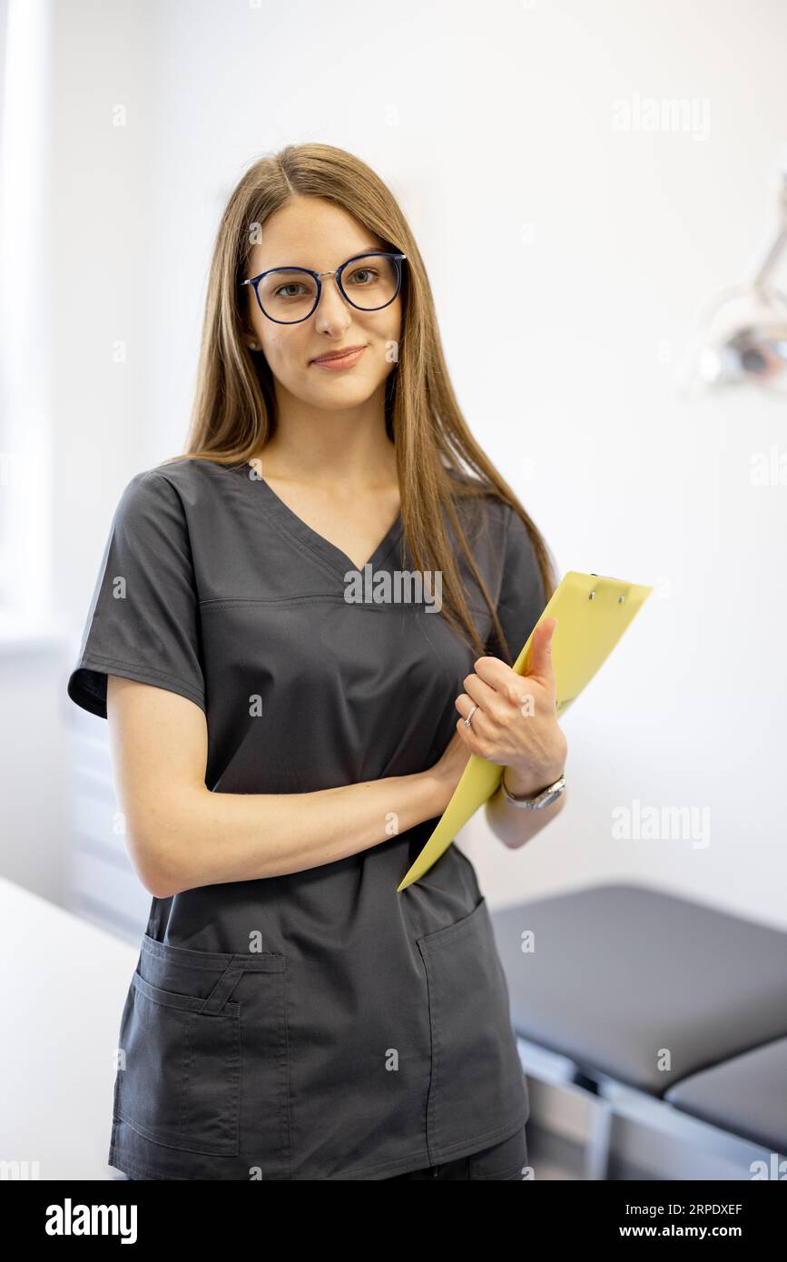 Portrait happy young female doctor hi-res stock photography and images ...