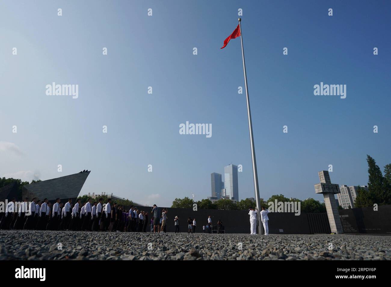 (190815) -- NANJING, Aug. 15, 2019 -- A flag-raising ceremony is held at the Memorial Hall of the Victims in Nanjing Massacre by Japanese Invaders in Nanjing, east China s Jiangsu Province, Aug. 15, 2019. Activities were held Thursday in Nanjing to commemorate the 74th anniversary of Japan s unconditional surrender in World War II. ) CHINA-NANJING-JAPAN S SURRENDER-74TH ANNIVERSARY (CN) JixChunpeng PUBLICATIONxNOTxINxCHN Stock Photo