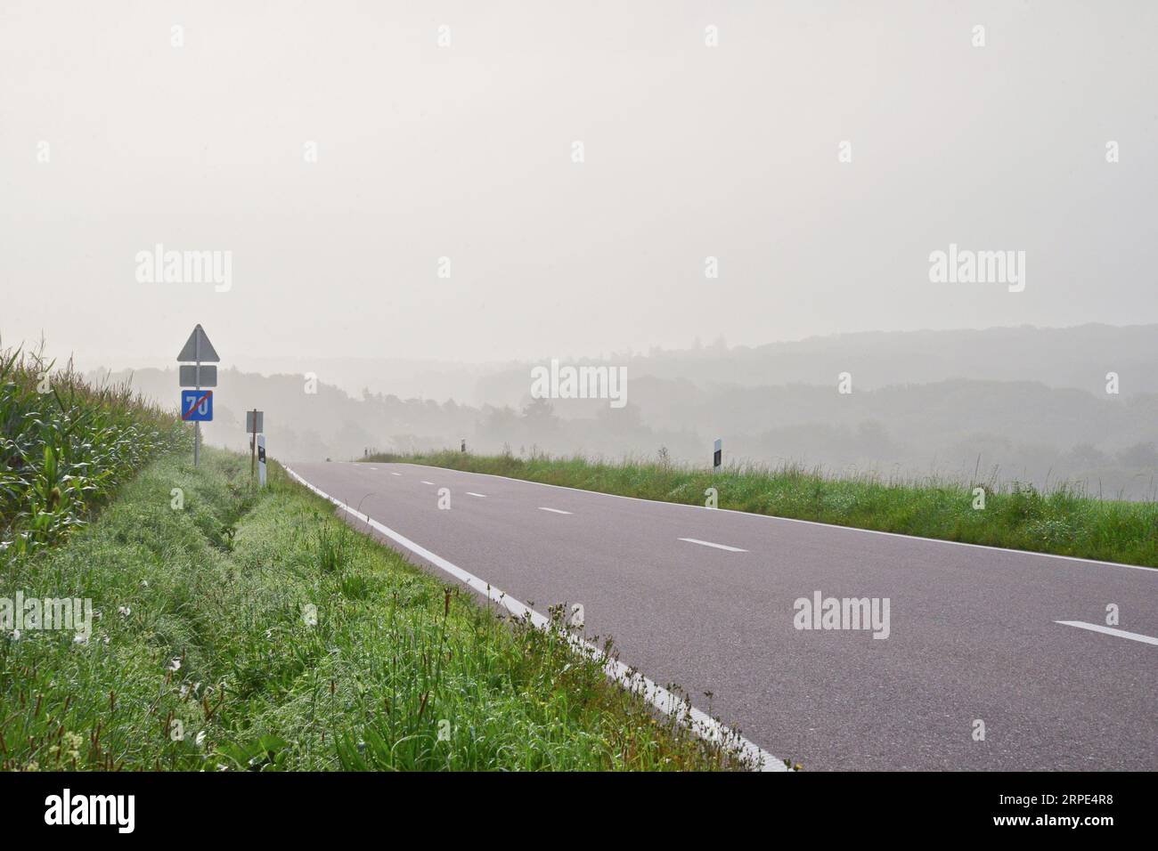 Empty road foggy day hi-res stock photography and images - Alamy