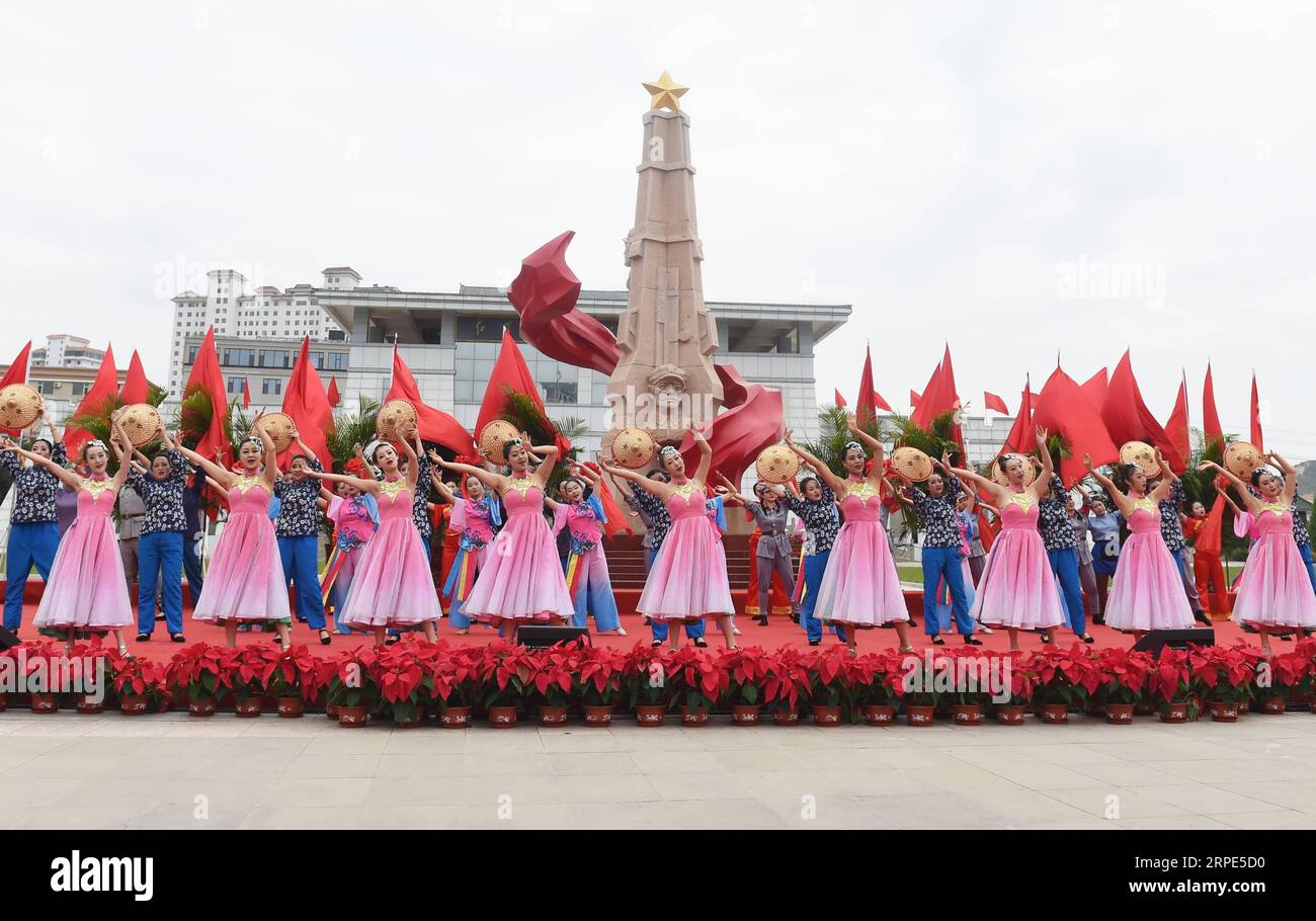 (190818) -- HUINING, Aug. 18, 2019 -- Artists perform during an event marking the conclusion of an activity that took journalists to retrace the route of the Long March, in Huining, northwest China s Gansu Province, Aug. 18, 2019. The activity, held from June 11 to Aug. 18, was aimed at paying tribute to the revolutionary martyrs and passing on the traditions of revolution. The Long March was a military maneuver carried out by the Chinese Workers and Peasants Red Army from 1934 to 1936. During this period, they left their bases and marched through rivers, mountains and arid grassland to break Stock Photo