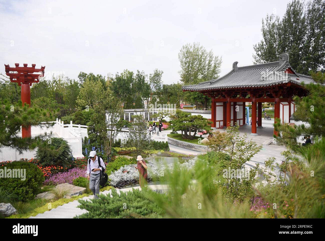 (190822) -- BEIJING, Aug. 22, 2019 -- Visitors tour at the Shaanxi Garden at the Beijing International Horticultural Exhibition in Beijing, capital of China, Aug. 22, 2019. The expo held its Shaanxi Day event on Thursday. ) CHINA-BEIJING-HORTICULTURAL EXPO-SHAANXI DAY (CN) ZhangxChenlin PUBLICATIONxNOTxINxCHN Stock Photo