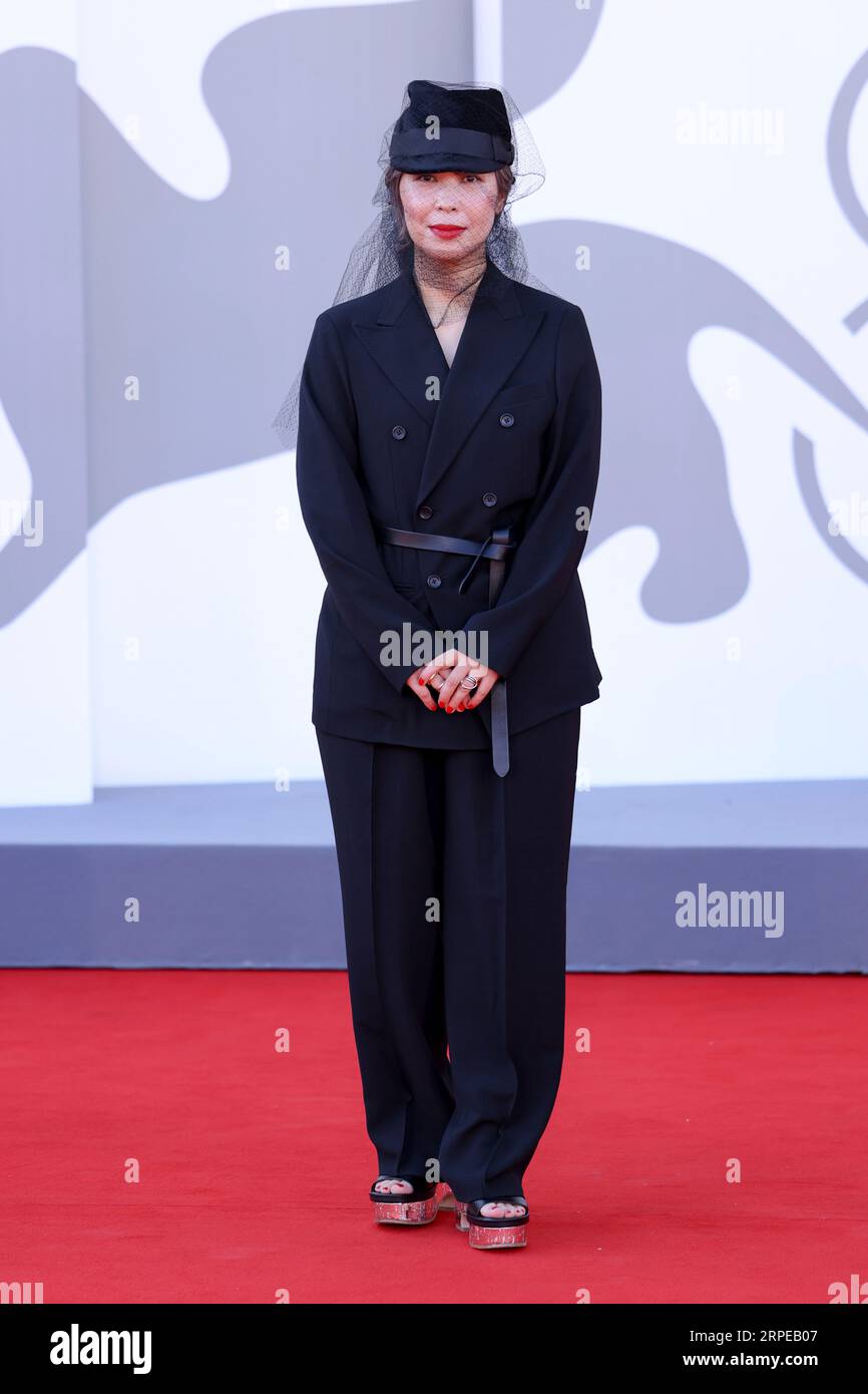 Planner Eiko Ishibashi poses for photographers upon arrival for the ...