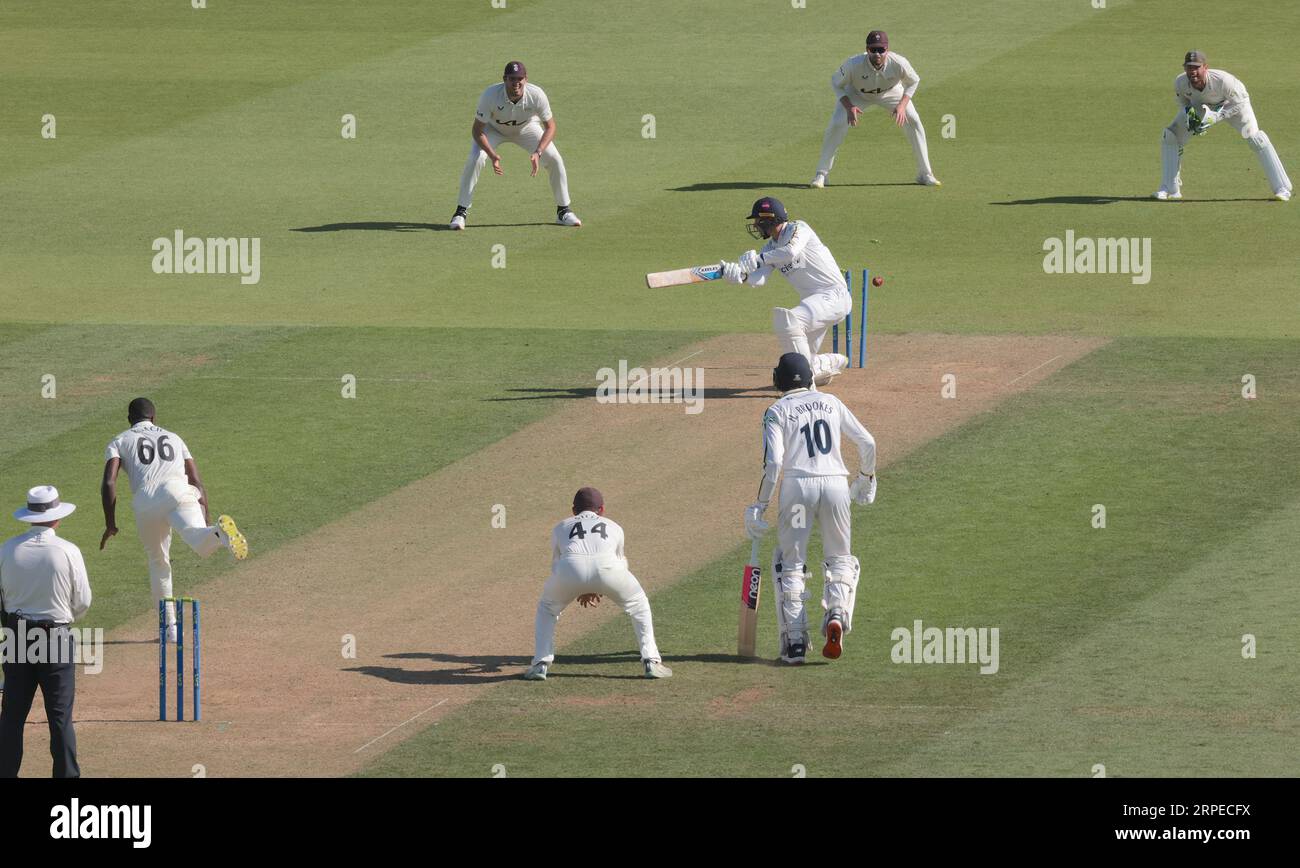 London, UK. 4th Sep, 2023. Surrey's Kemar Roach bowls Danny Briggs as Surrey take on Warwickshire in the County Championship at the Kia Oval, day two. Credit: David Rowe/Alamy Live News Stock Photo