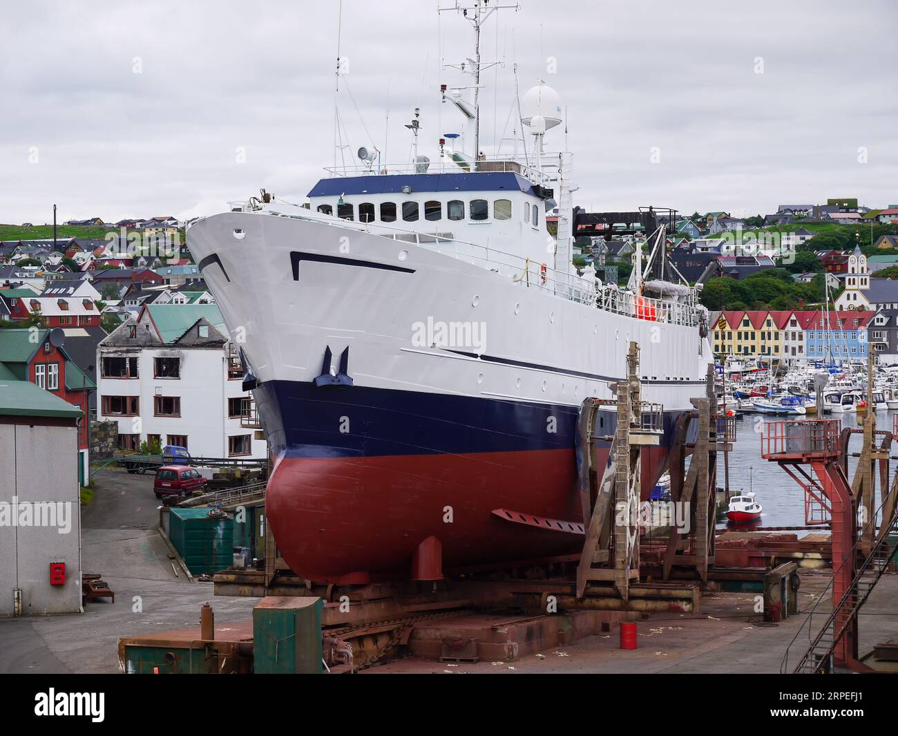 A fishing vessel at a small shipyard in the Faroe Islands Stock Photo