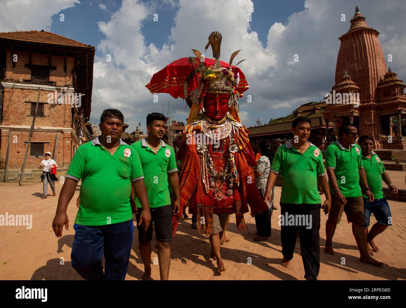 (190828) -- BHAKTAPUR (NEPAL), Aug. 28, 2019 (Xinhua) -- Devotees take part in a parade during the Pancha Dan festival in Bhaktapur, Nepal, on Aug. 28, 2019. Pancha Dan, the festival of five summer gifts, is observed by the Buddhists by giving away five elements including wheat grains, rice grains, salt, money and fruit. (Photo by Sulav Shrestha/Xinhua) NEPAL-BHAKTAPUR-PANCHA DAN FESTIVAL PUBLICATIONxNOTxINxCHN Stock Photo