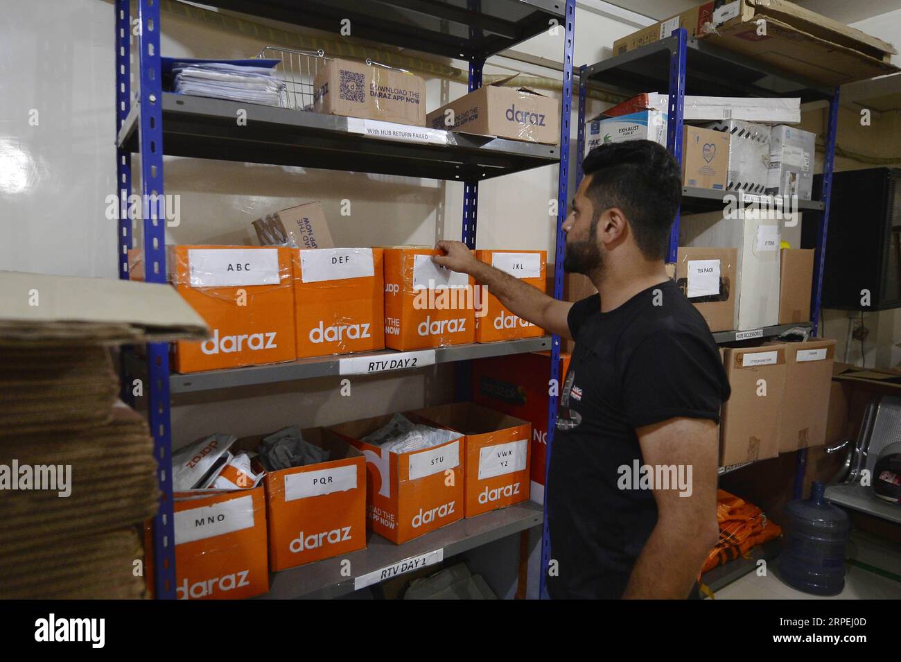 https://c8.alamy.com/comp/2RPEJ0D/190829-islamabad-aug-29-2019-a-staff-member-of-a-daraz-outlet-checks-packages-in-islamabad-capital-of-pakistan-on-aug-29-2019-with-increasing-digitization-and-internet-accessibility-e-commerce-market-of-pakistan-is-becoming-one-of-the-fastest-growing-markets-across-the-globe-with-a-considerable-surge-in-online-merchants-e-commercial-platforms-and-online-payment-facilities-in-recent-times-to-go-with-spotlight-pakistani-entrepreneurs-eye-chinese-cooperation-to-augment-booming-e-commerce-market-photo-by-xinhua-pakistan-islamabad-e-commerce-market-ahmadxkamal-publicationxno-2RPEJ0D.jpg