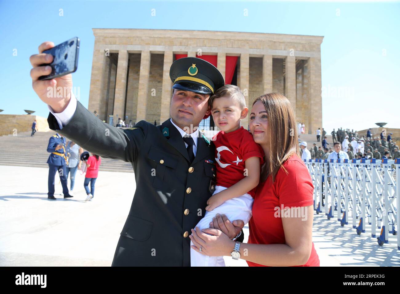 (190830) -- ANKARA, Aug. 30, 2019 -- A Turkish soldier takes selfie with his family during the 97th anniversary of Victory Day in Ankara, Turkey, Aug. 30, 2019. Turkey marked on Friday the 97th anniversary of Victory Day, the day the Turks defeated the Greek forces at the Battle of Dumlupinar, the final battle of the Turkish War of Independence in 1922. (Photo by /Xinhua) TURKEY-ANKARA-VICTORY DAY MustafaxKaya PUBLICATIONxNOTxINxCHN Stock Photo