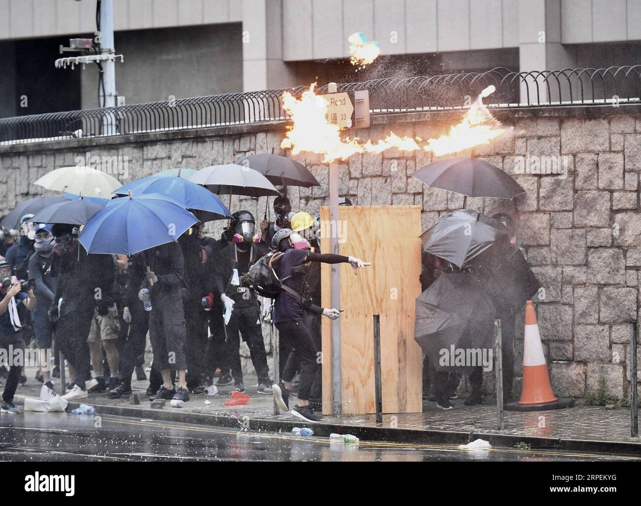 (190831) -- HONG KONG, Aug. 31, 2019 () -- Violent protesters throw petrol bombs at police officers in south China s Hong Kong, Aug. 31, 2019. () CHINA-HONG KONG-PROTEST-VIOLENCE (CN) Xinhua PUBLICATIONxNOTxINxCHN Stock Photo