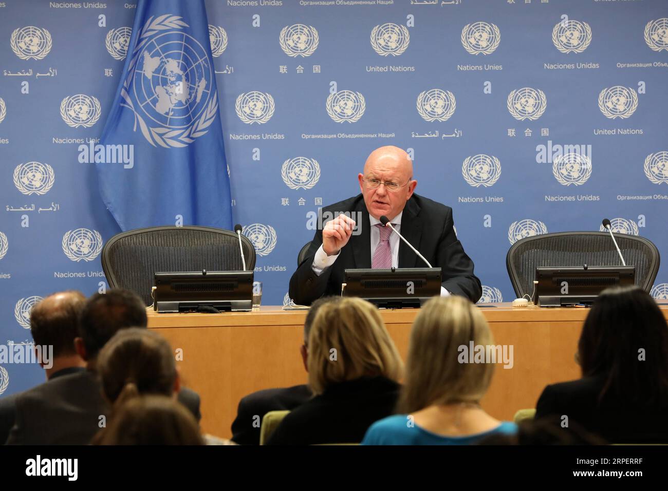 (190903) -- UNITED NATIONS, Sept. 3, 2019 -- Vassily Nebenzia (Rear), Russia s UN ambassador and president of the Security Council for the month of September, speaks to journalists during a press briefing at the UN headquarters in New York, on Sept. 3, 2019. United Nations Security Council will highlight UN cooperation with regional organizations and the settlement of African problems in September, Vassily Nebenzia said Tuesday. ) UN-SECURITY COUNCIL-RUSSIA-PRESS BRIEFING MaxJianguo PUBLICATIONxNOTxINxCHN Stock Photo