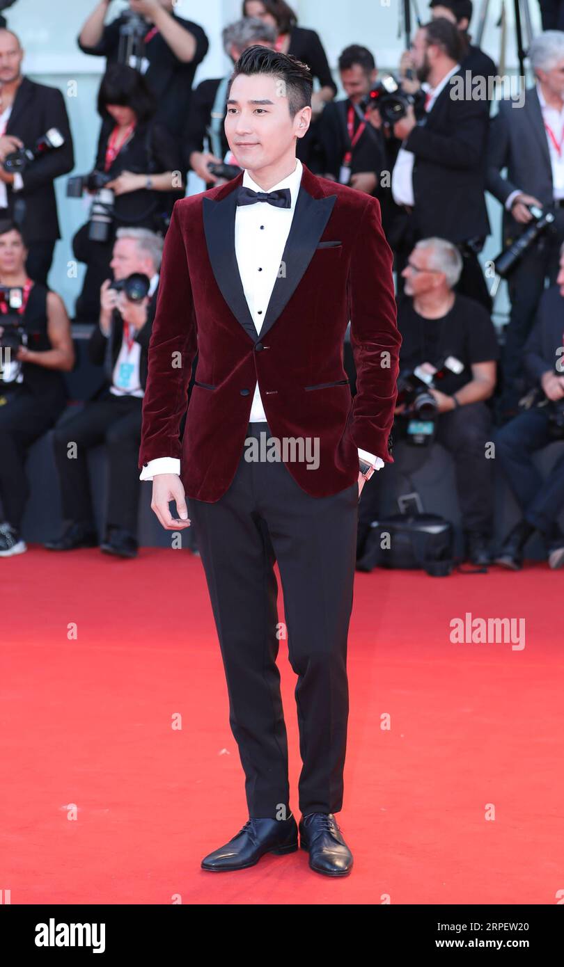 (190905) -- VENICE, Sept. 5, 2019 -- Chinese actor Mark Chao poses on the red carpet for the premiere of the film Saturday Fiction during the 76th Venice International Film Festival in Venice, Italy, Sept. 4, 2019. Chinese film Saturday Fiction is competing for the Golden Lion along with 20 other films at the 76th Venice Film Festival, running at the Lido of the lagoon city until Sept. 7. ) ITALY-VENICE-FILM FESTIVAL-CHINESE FILM SATURDAY FICTION -RED CARPET ChengxTingting PUBLICATIONxNOTxINxCHN Stock Photo