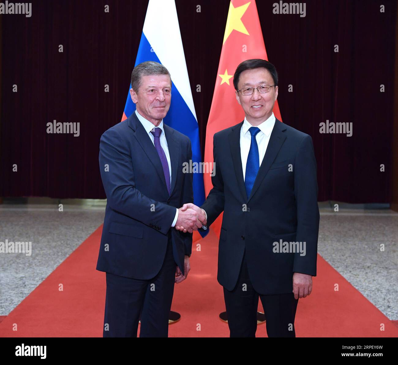 190906 -- BEIJING, Sept. 6, 2019 -- Chinese Vice Premier Han Zheng, also a member of the Standing Committee of the Political Bureau of the Communist Party of China Central Committee, meets with Russian Deputy Prime Minister Dmitry Kozak in Beijing, capital of China, Sept. 6, 2019. Han and Kozak co-chaired the 16th meeting of the China-Russia Energy Cooperation Committee in Beijing on Friday.  CHINA-BEIJING-HAN ZHENG-DMITRY KOZAK-MEETING CN RaoxAimin PUBLICATIONxNOTxINxCHN Stock Photo