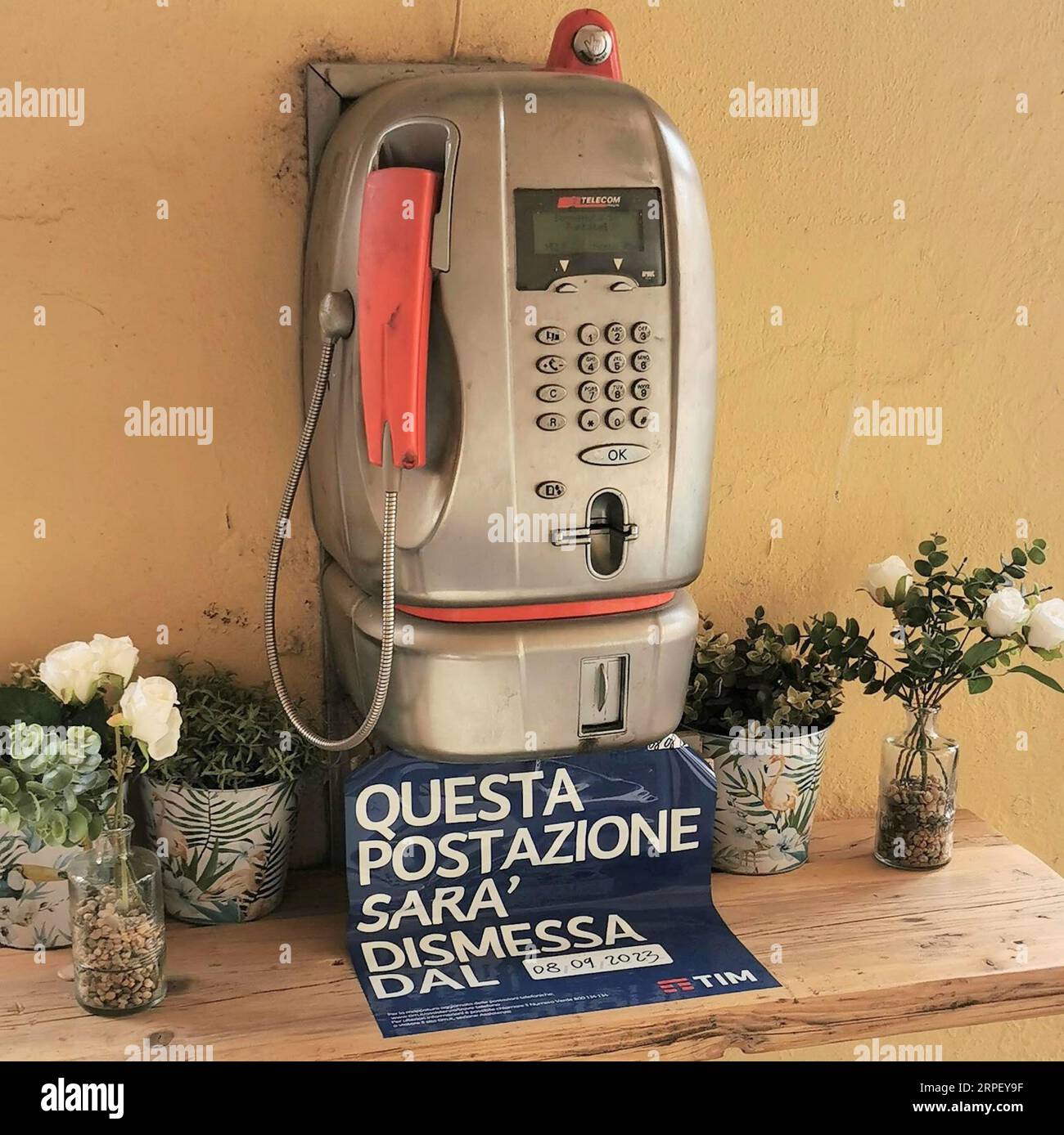 Old public phone about to be taken out of service in Greve in Chianti, Italy Stock Photo