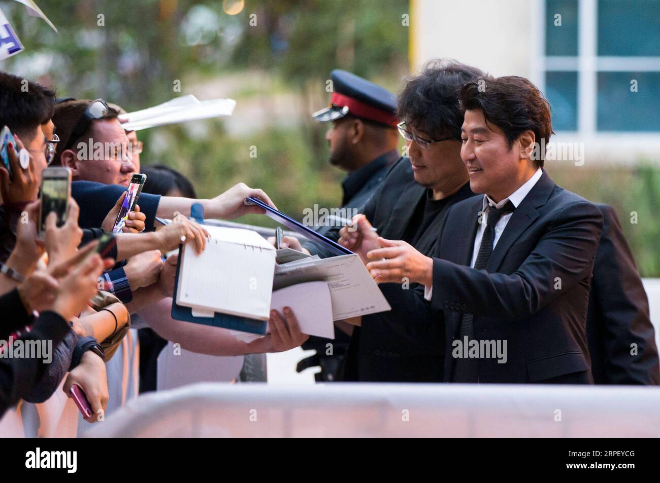 190907 -- TORONTO, Sept. 7, 2019 -- Actor Song Kang-ho R and director Bong Joon-ho2nd R attend the Canadian premiere of the film Parasite at Ryerson Theatre during the 2019 Toronto International Film FestivalTIFF in Toronto, Canada, Sept. 6, 2019. Photo by /Xinhua CANADA-TORONTO-TIFF-FILM PARASITE ZouxZheng PUBLICATIONxNOTxINxCHN Stock Photo