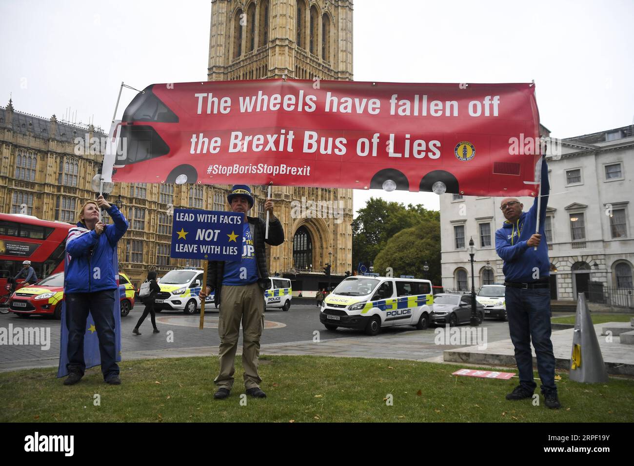 (190909) -- LONDON, Sept. 9, 2019 -- Demonstrators gather outside the Houses of Parliament holding placards in London, Britain, on Sept. 9, 2019. The British parliament will be prorogued at the close of business on Monday night until Oct. 14, Downing Street confirmed. The move came after Prime Minister Boris Johnson requested the Queen to allow such a suspension, from a date this week until Oct. 14. (Photo by Alberto Pezzali/Xinhua) BRITAIN-LONDON-BREXIT-PARLIAMENT-PROROGATION HanxYan PUBLICATIONxNOTxINxCHN Stock Photo