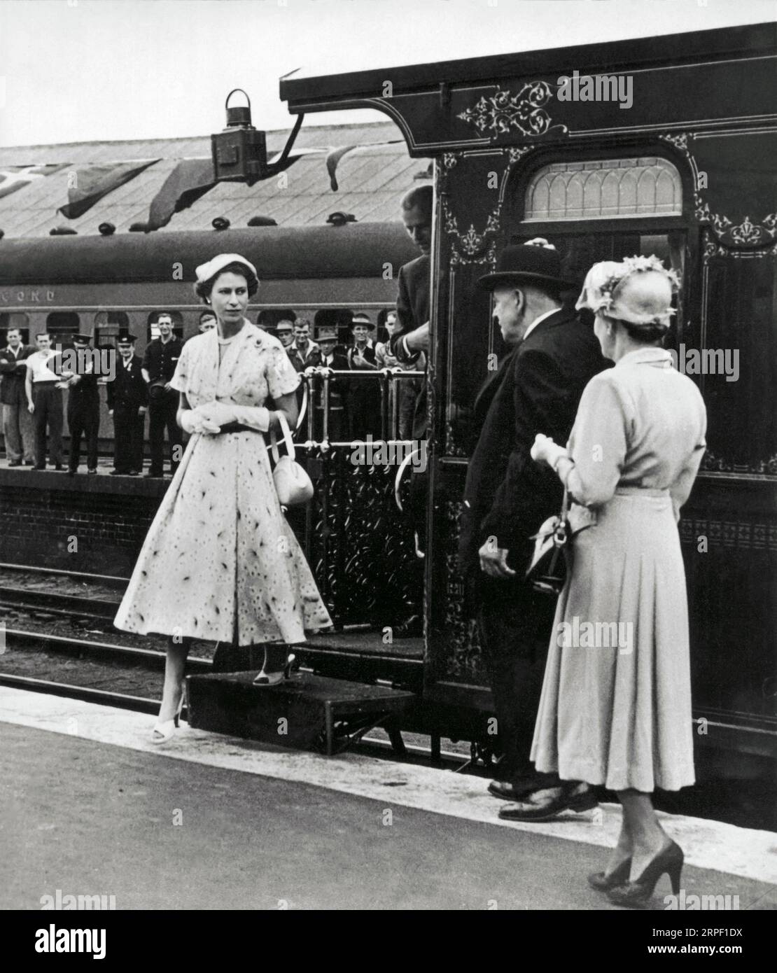 Queen Elizabeth II stepping off the Royal Train in 1954 during her Royal Visit to New South Wales. Stock Photo