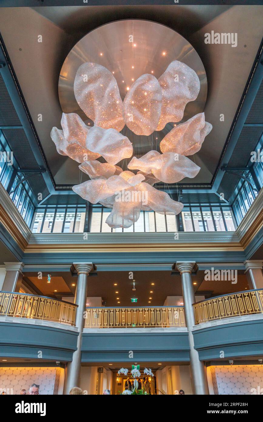 The decorative chandelier in the main lobby of the Empress Hotel in Victoria, Vancouver Island, British Columbia, Canada. Stock Photo