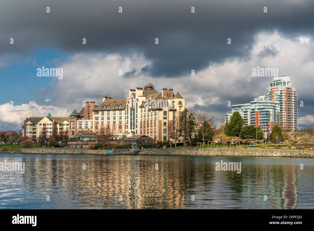 The Delta Marriott Hotel reflected in the water in Victoria, Vancouver