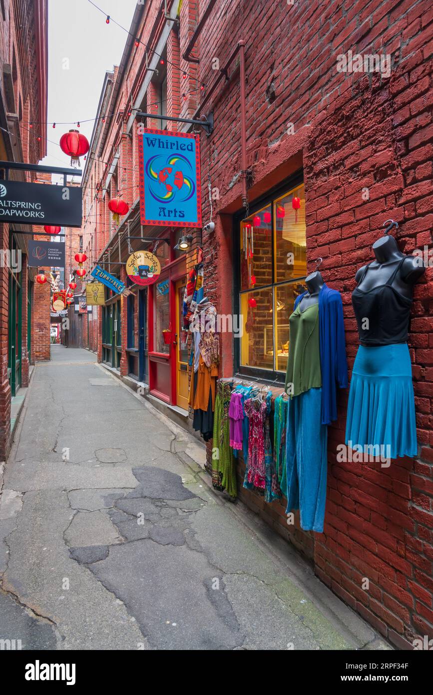 The narrow Fan Tan alley with shops in Victoria, British Columbia, Canada. Stock Photo