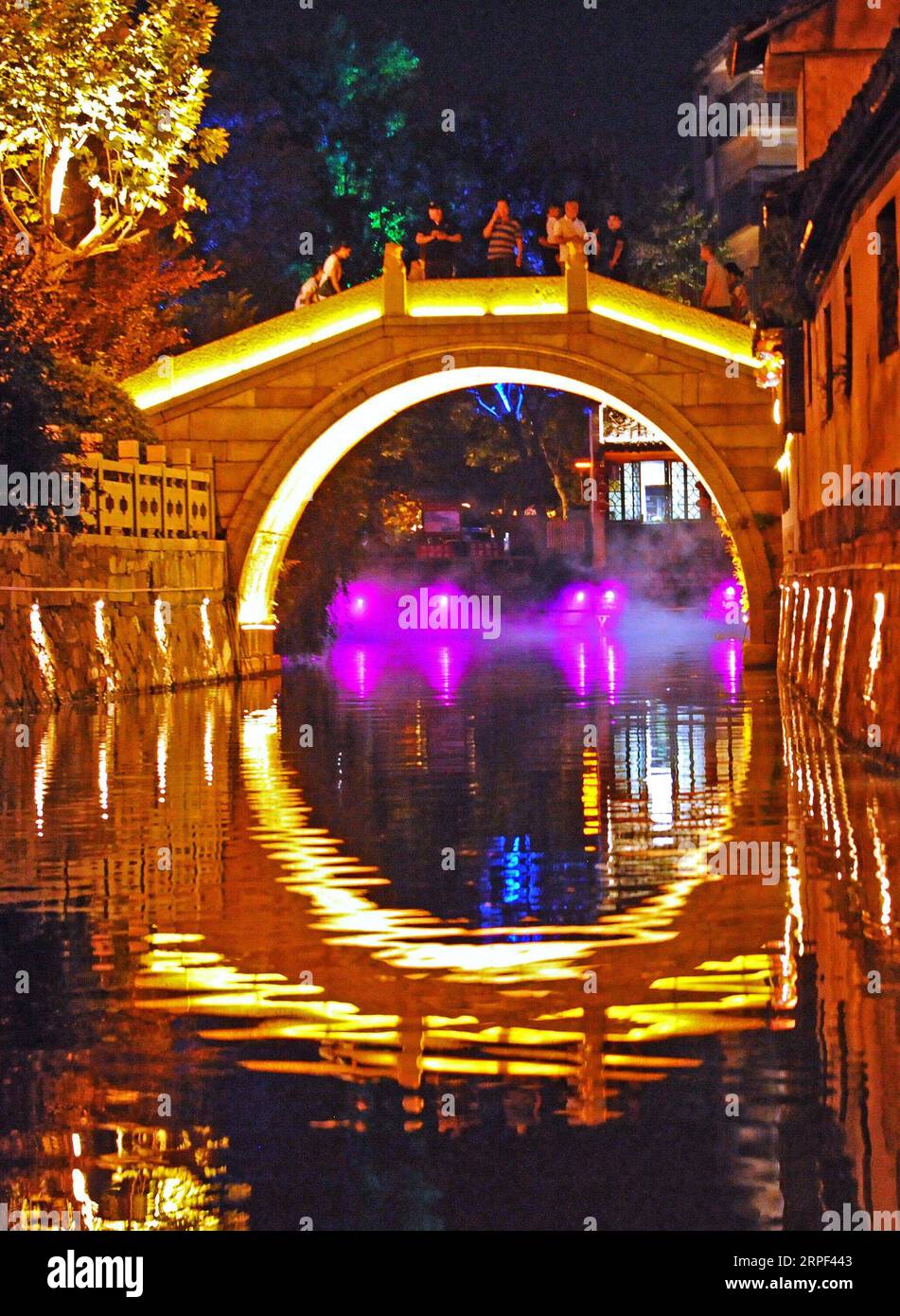 (190912) -- HUZHOU, Sept. 12, 2019 -- People enjoy the night view of an ancient river course in Nanxun Town of Huzhou City, east China s Zhejiang Province, Sept. 11, 2019. ) CHINA-ZHEJIANG-RIVER-NIGHT VIEW (CN) TanxJin PUBLICATIONxNOTxINxCHN Stock Photo