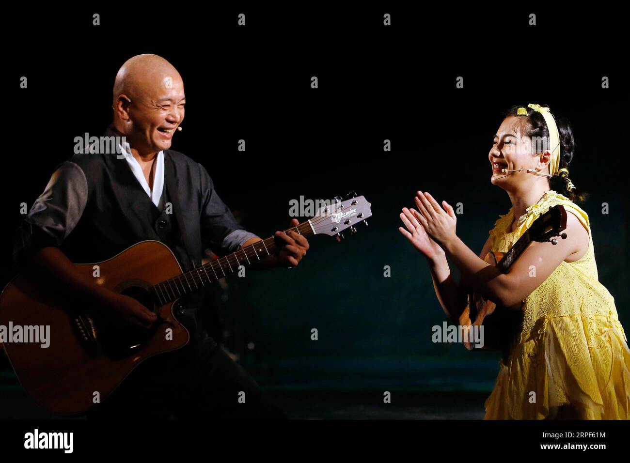 (190914) -- BUCHAREST, Sept. 14, 2019 -- Tang Yan (R) and Liu Xiaoming of China National Theatre for Children perform in TR-E-E show, a story of a young ginkgo tree, during the 15th ImPuls International Festival of Contemporary Animation Theatre in Bucharest, capital of Romania, Sept. 13, 2019. (Photo by /Xinhua) ROMANIA-BUCHAREST-CHINESE PERFORMANCE CristianxCristel PUBLICATIONxNOTxINxCHN Stock Photo