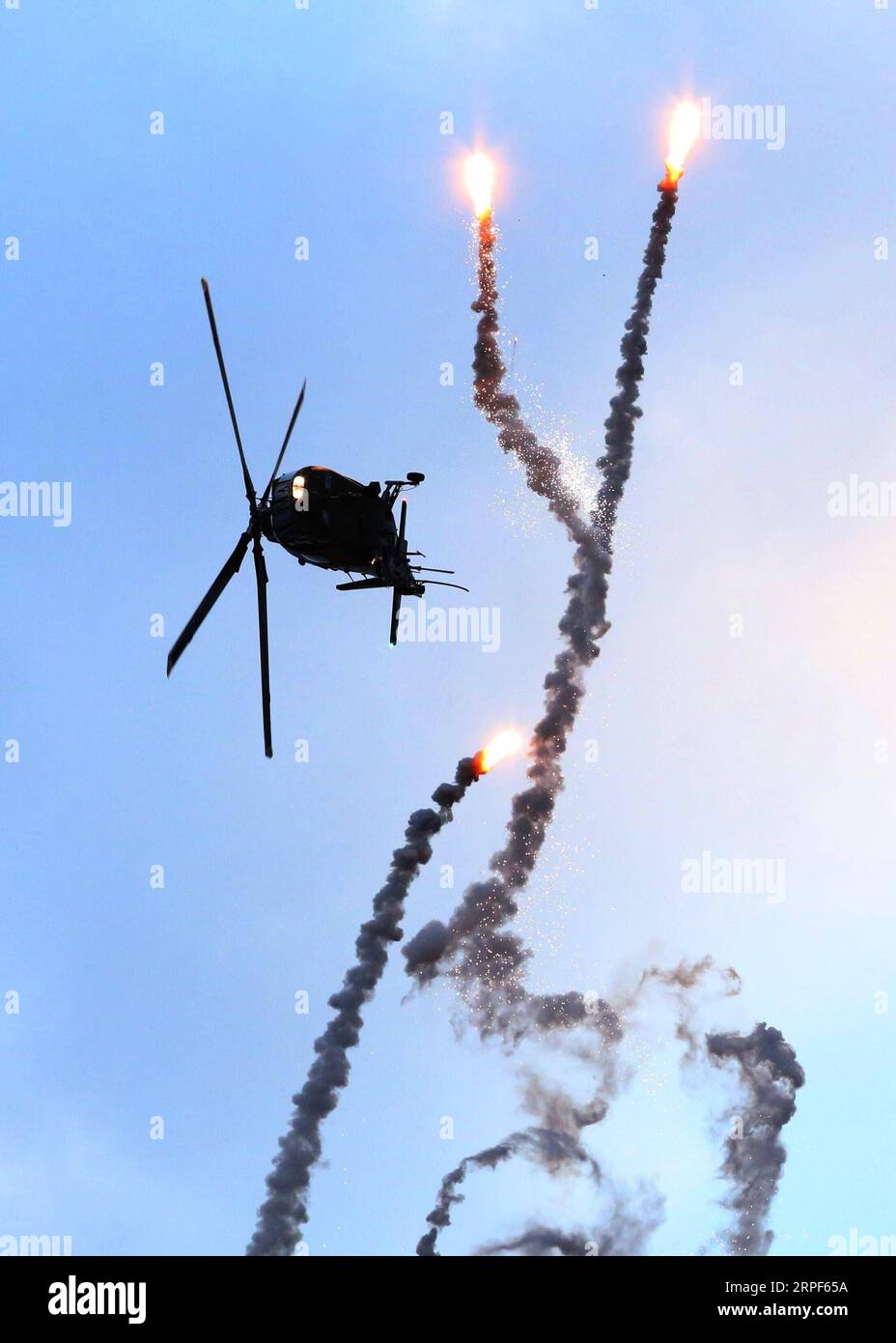 (190914) -- BRUSSELS, Sept. 14, 2019 -- A helicopter Agusta A-109 of the Belgian Air Force flies at the Sanicole Sunset Airshow in Hechtel, Belgium, Sept. 13, 2019. ) BELGIUM-SANICOLE SUNSET AIRSHOW WangxXiaojun PUBLICATIONxNOTxINxCHN Stock Photo