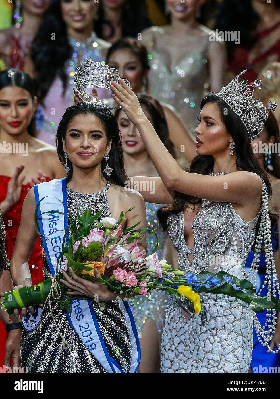 (190915) -- QUEZON CITY, Sept. 16, 2019 (Xinhua) -- Kelley Day (L) is crowned as Miss Eco Philippines 2019 during the coronation night of Miss World Philippines 2019 in Quezon City, the Philippines, Sept. 16, 2019. Michelle Dee won the crown of Miss World Philippines 2019 and will represent the Philippines in the Miss world 2019 pageant in December. (Xinhua/Rouelle Umali) PHILIPPINES-QUEZON CITY-MISS WORLD PHILIPPINES 2019-CORONATION NIGHT PUBLICATIONxNOTxINxCHN Stock Photo