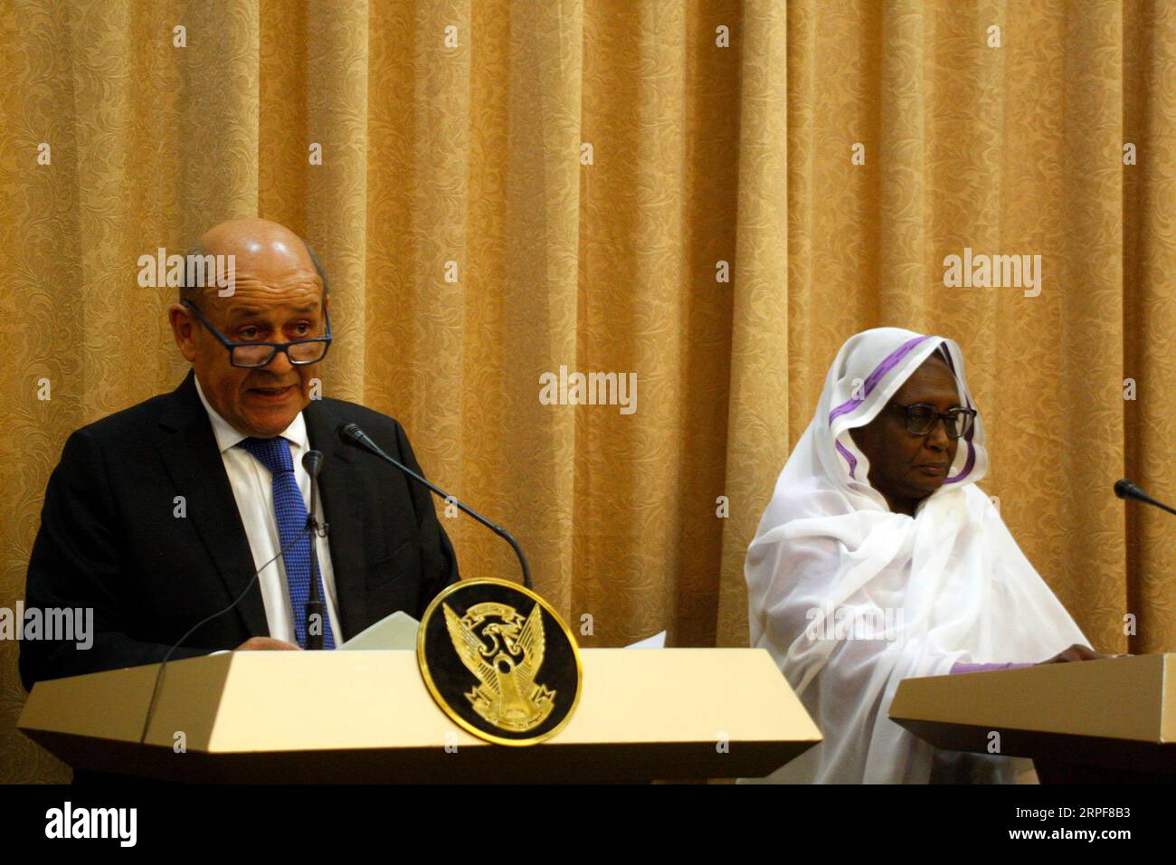 (190916) -- KHARTOUM, Sept. 16, 2019 -- French Foreign Minister Jean-Yves Le Drian (L) and Sudan s Foreign Minister Asma Mohamed Abdullah attend a joint press conference in Khartoum, Sudan, on Sept. 16, 2019. French Foreign Minister Jean-Yves Le Drian on Monday voiced his country s support for the current transitional period in Sudan to achieve peace and justice. ) SUDAN-KHARTOUM-FRANCE-FM-VISIT MohamedxKhidir PUBLICATIONxNOTxINxCHN Stock Photo