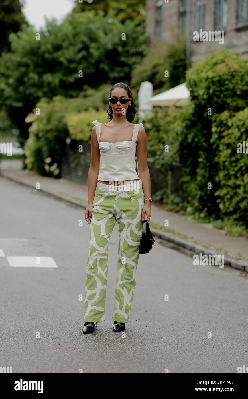 Street style, Flame and Chili Dia arriving at Ganni Spring Summer 2021  show, held at Badsmandsstraede, Copenhagen, Denmark, on August 10th, 2020.  Photo by Marie-Paola Bertrand-Hillion/ABACAPRESS.COM Stock Photo - Alamy
