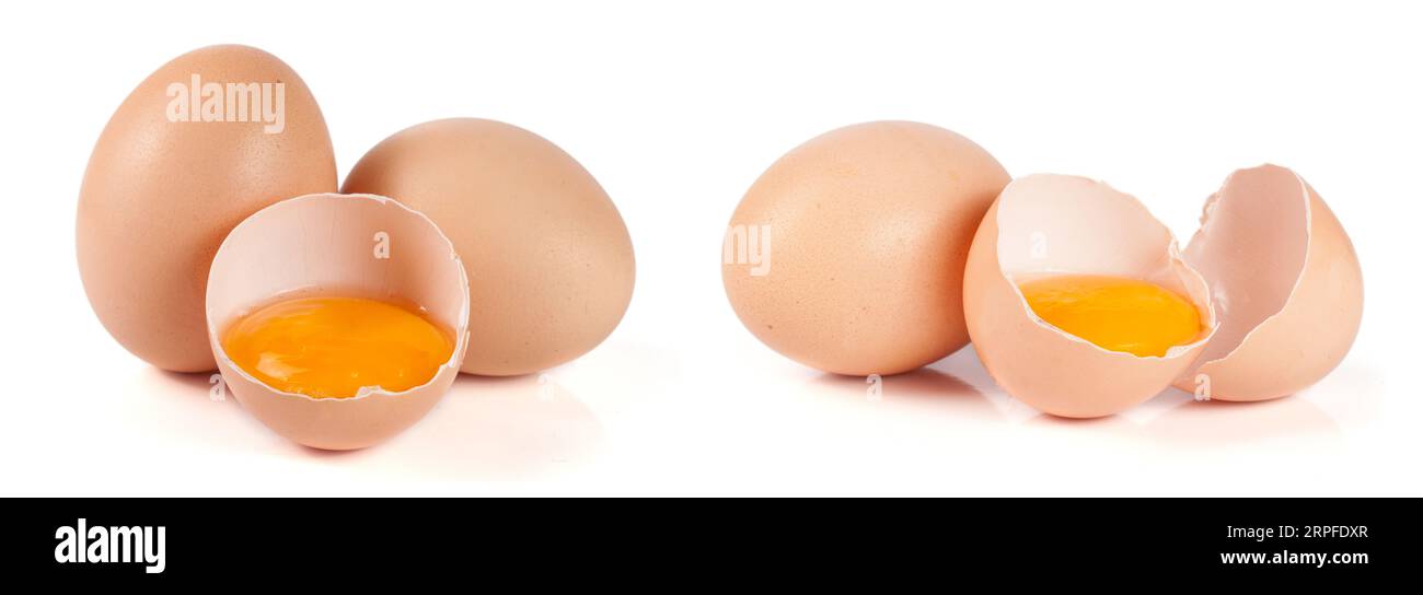 two whole eggs and broken egg isolated on white background Stock Photo