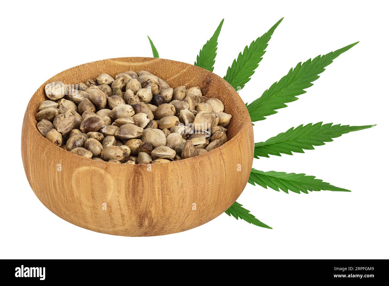 Hemp seeds in wooden bowl isolated on white background with full depth ...