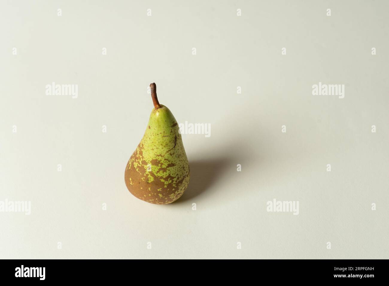 Large, green, organic pear on a white background Stock Photo