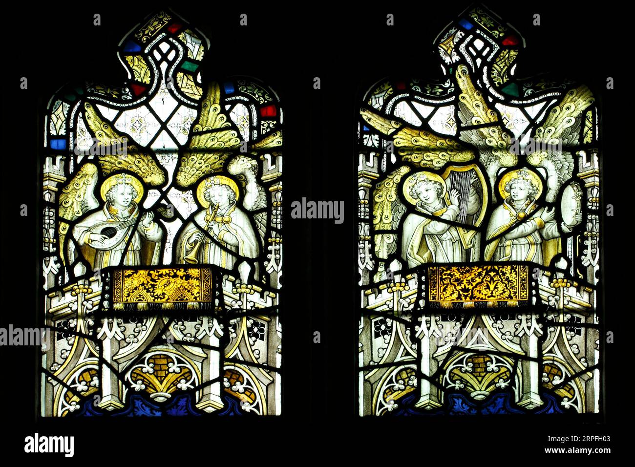 Minstrels in Stained Glass. Lyre harp, tambourine hand drum, lute and