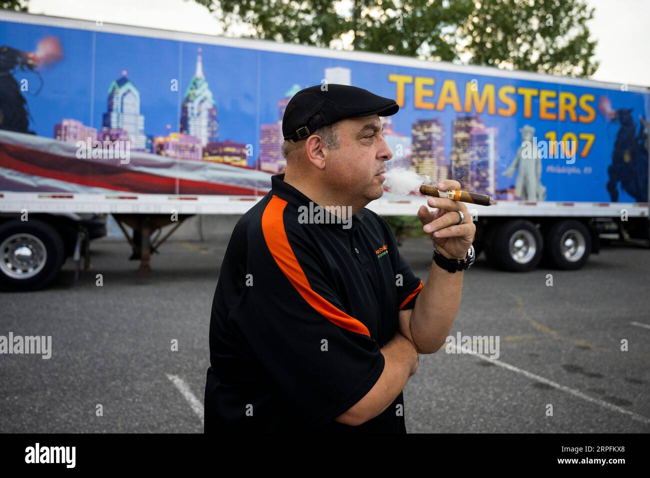 Rocco gallelli smokes a cigar before a labor day event with president