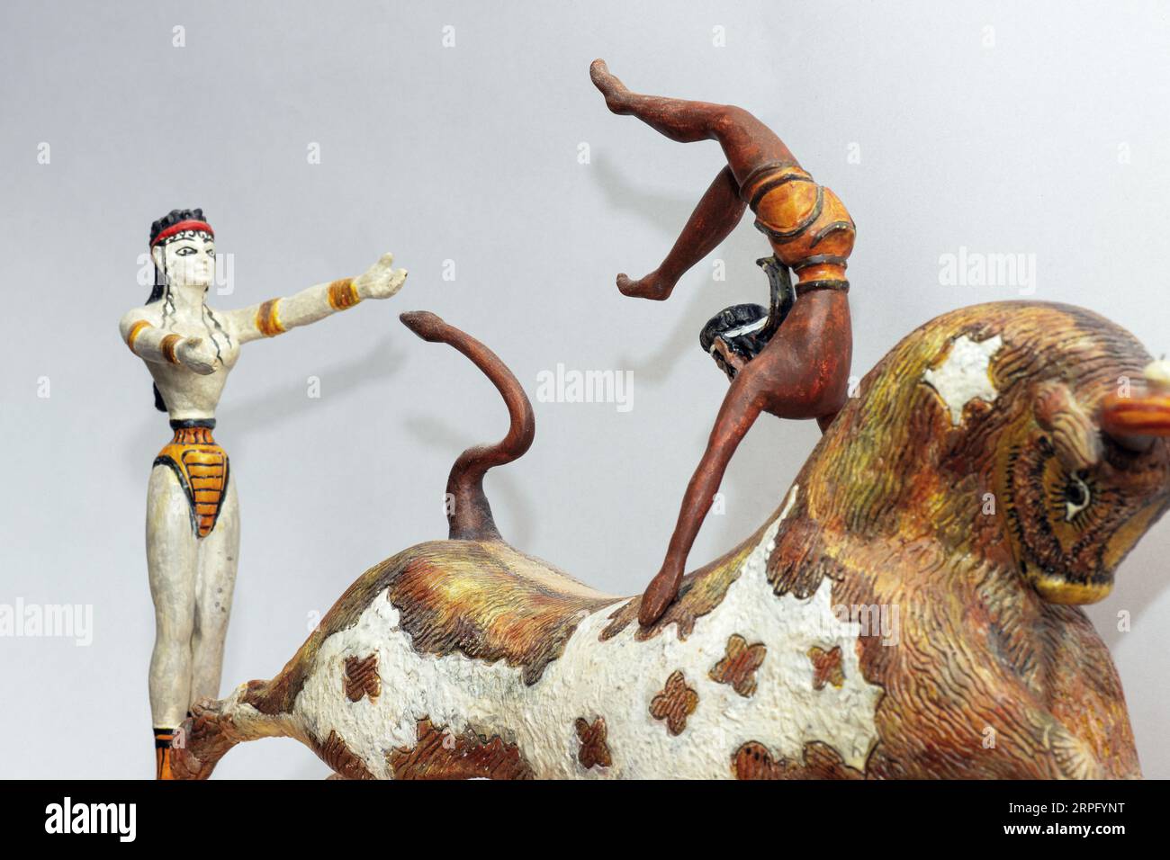 Famous Minoan  Bronze Age Toreador Fresco from Knossos, Crete turned 3D by unknown 20th century sculptor.One time stunt or semi religious sport? Stock Photo