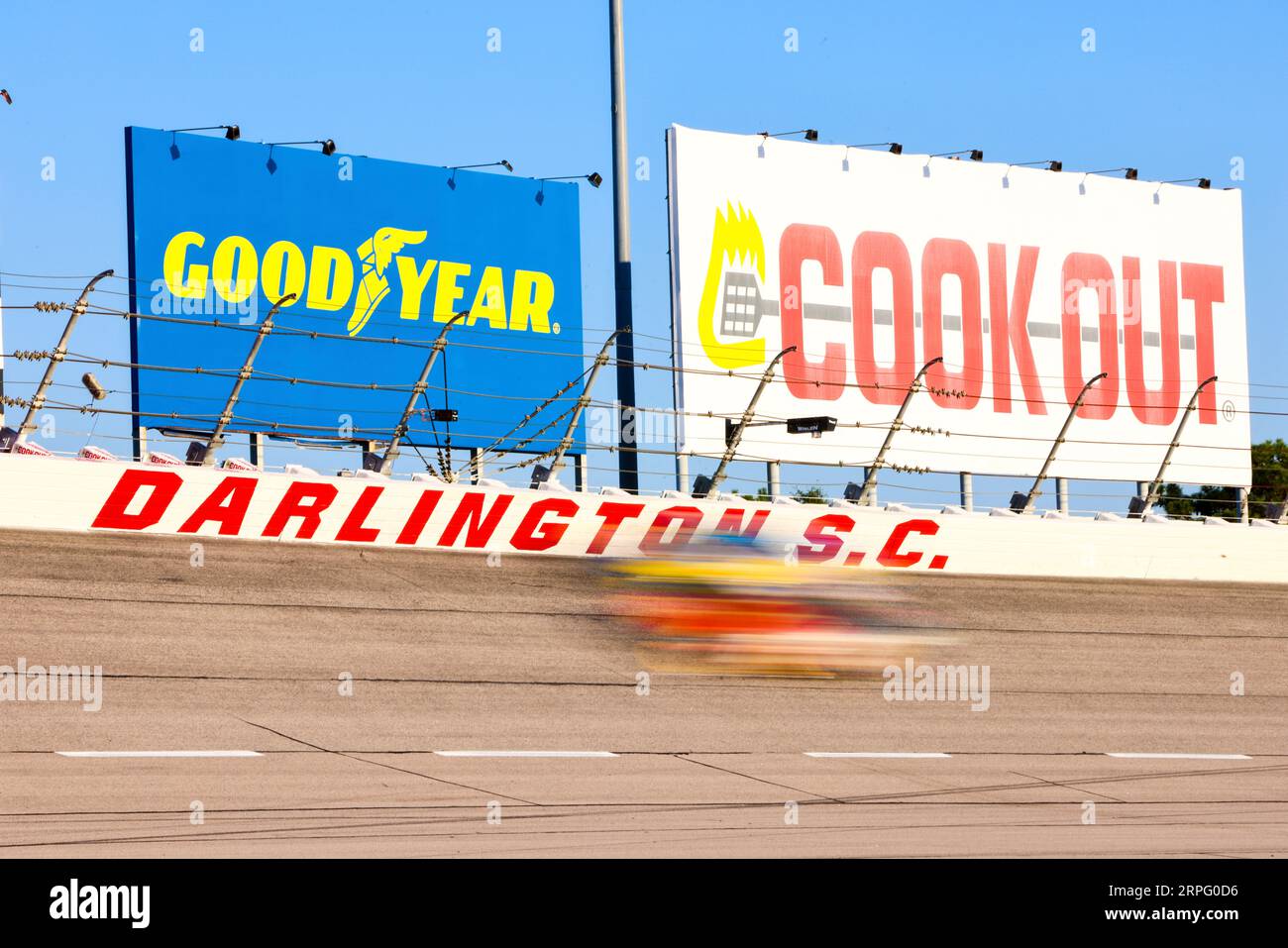 DARLINGTON, SC SEPTEMBER 03 Cars speed between turns one and two