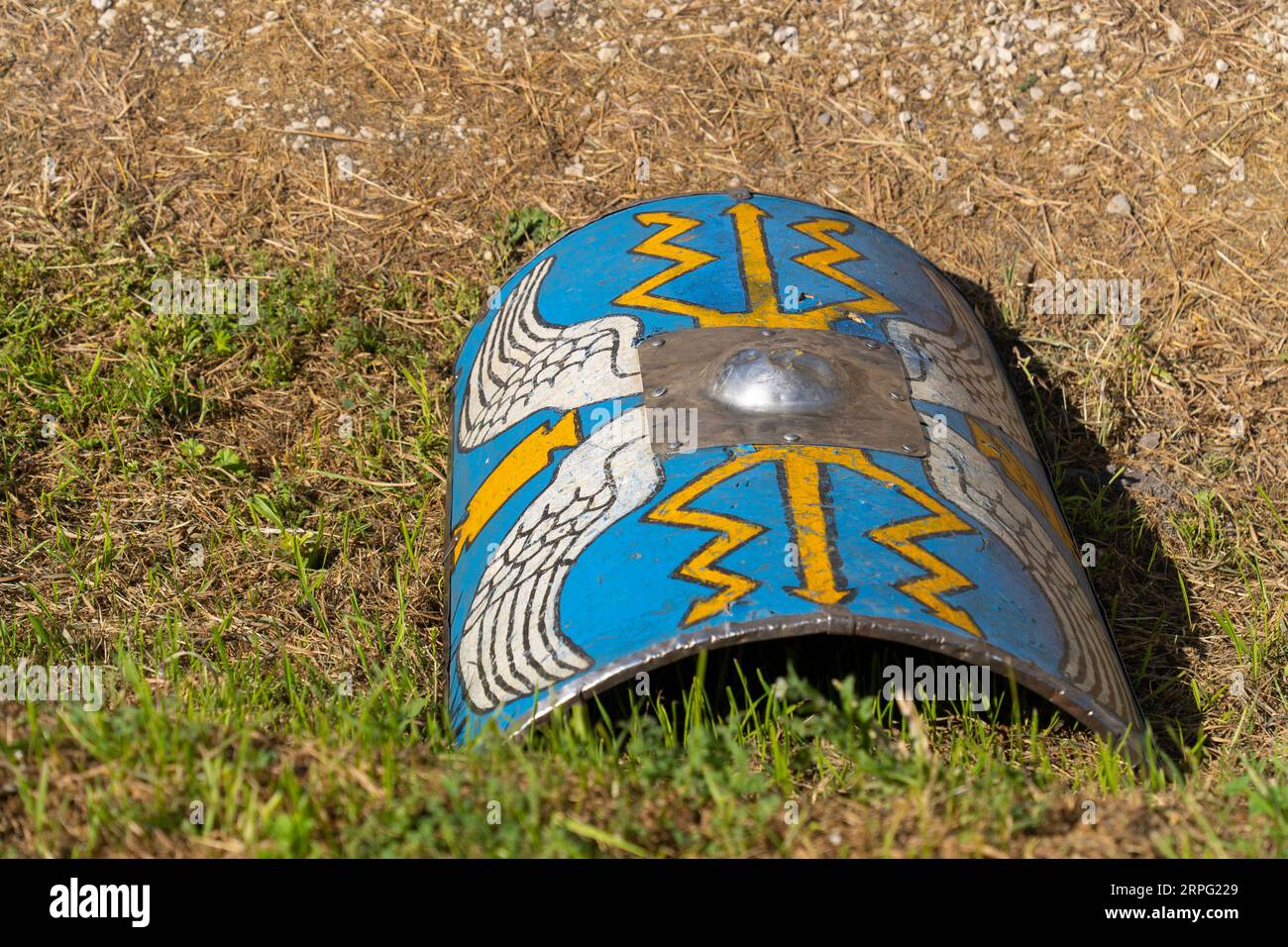 Ancient Roman blue shields in the grass Stock Photo