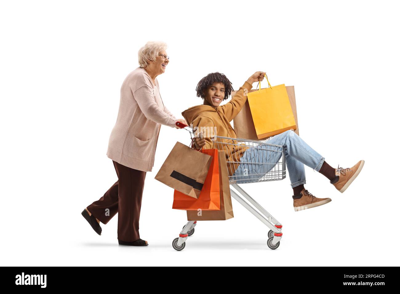 Grandmother pushing a young african american man with shopping bags