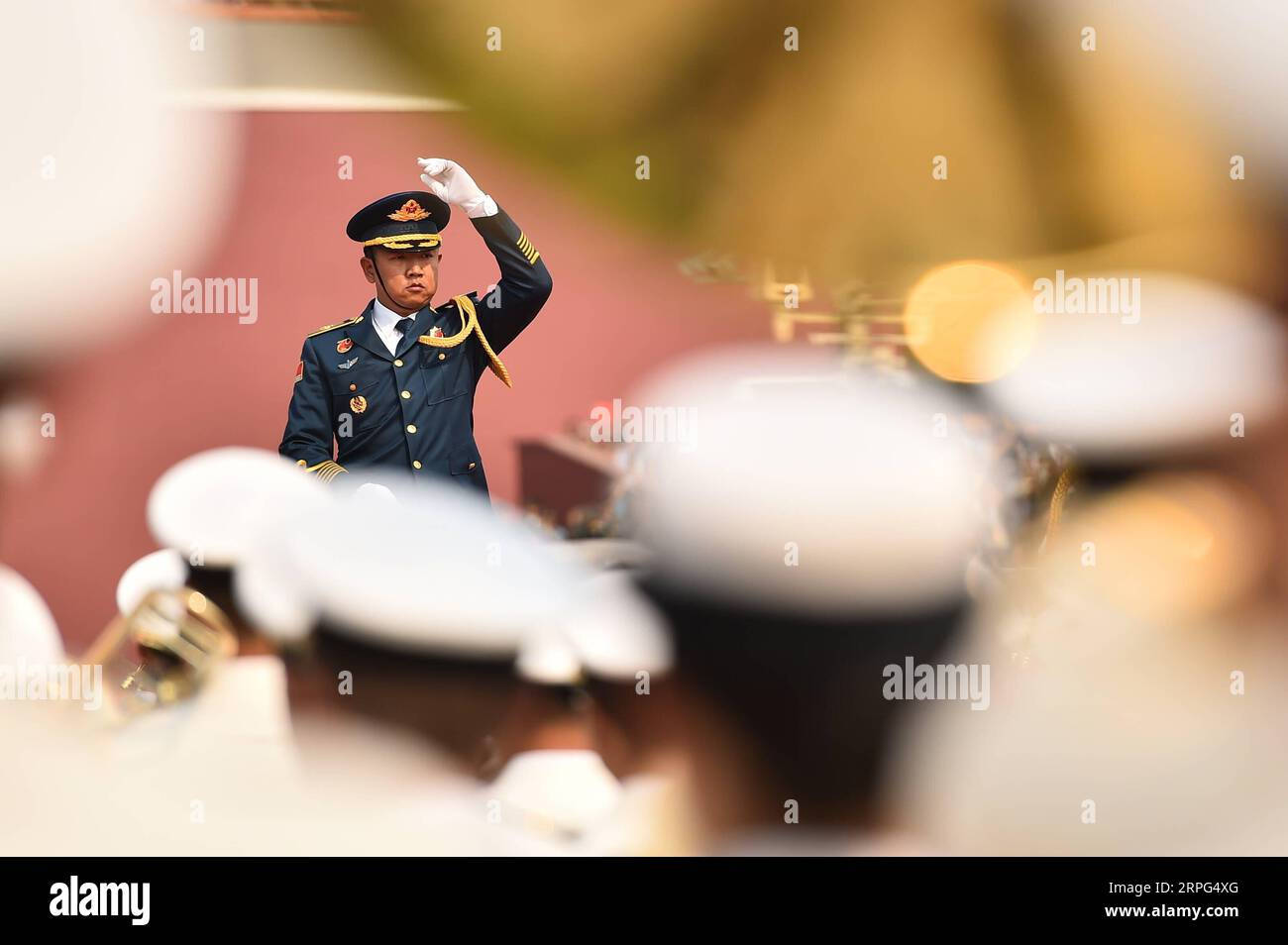 191001 -- BEIJING, Oct. 2, 2019 -- The conductor of a military band ...